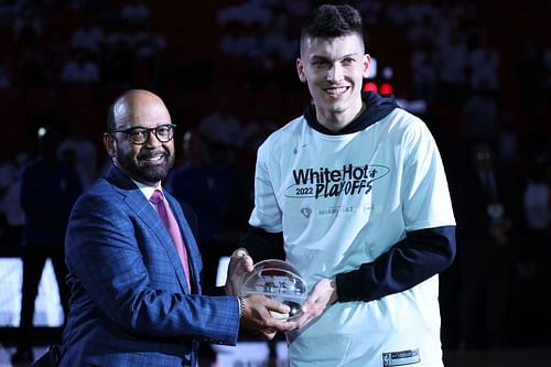 Tyler Herro of the Miami Heat is presented with the NBA Sixth Man of the Year award prior to Game 2.