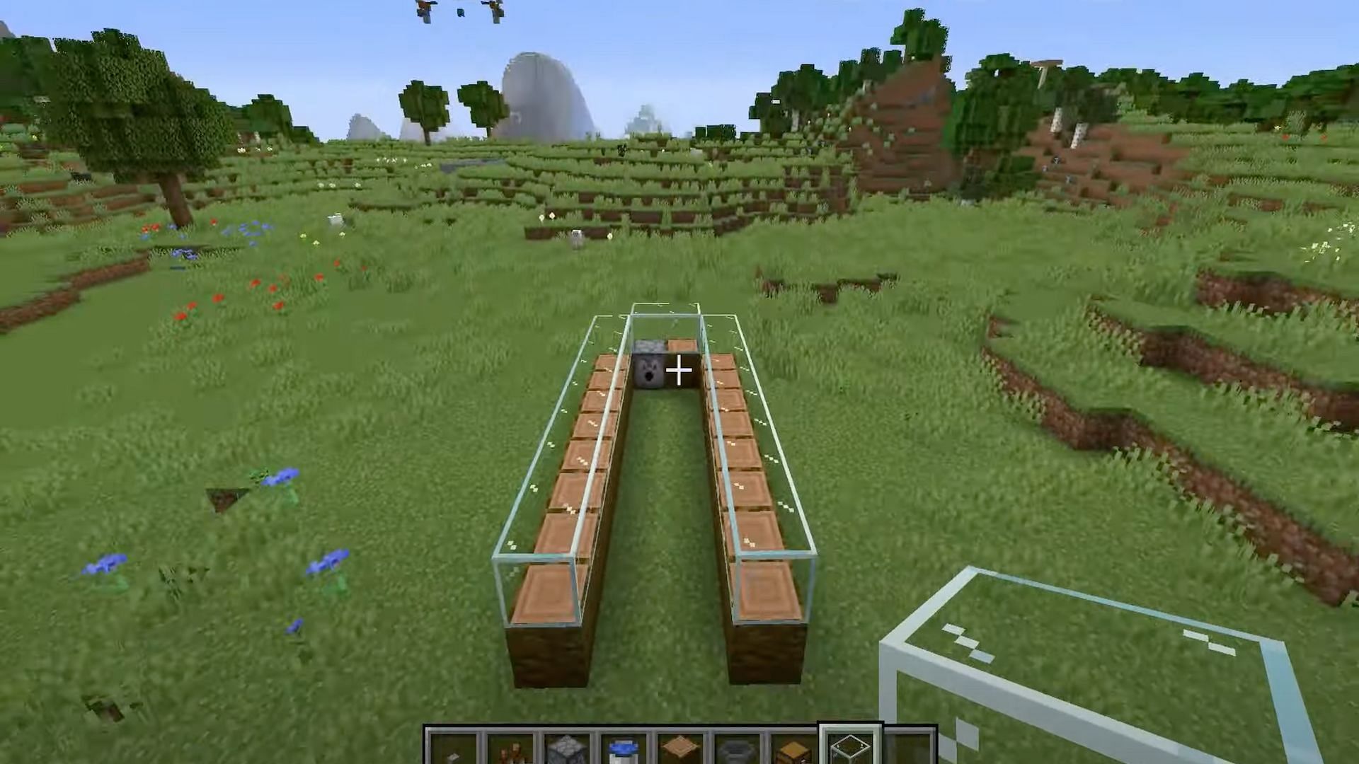 Minecraft players need to place glass blocks across the top (Image via NaMiature/YouTube)