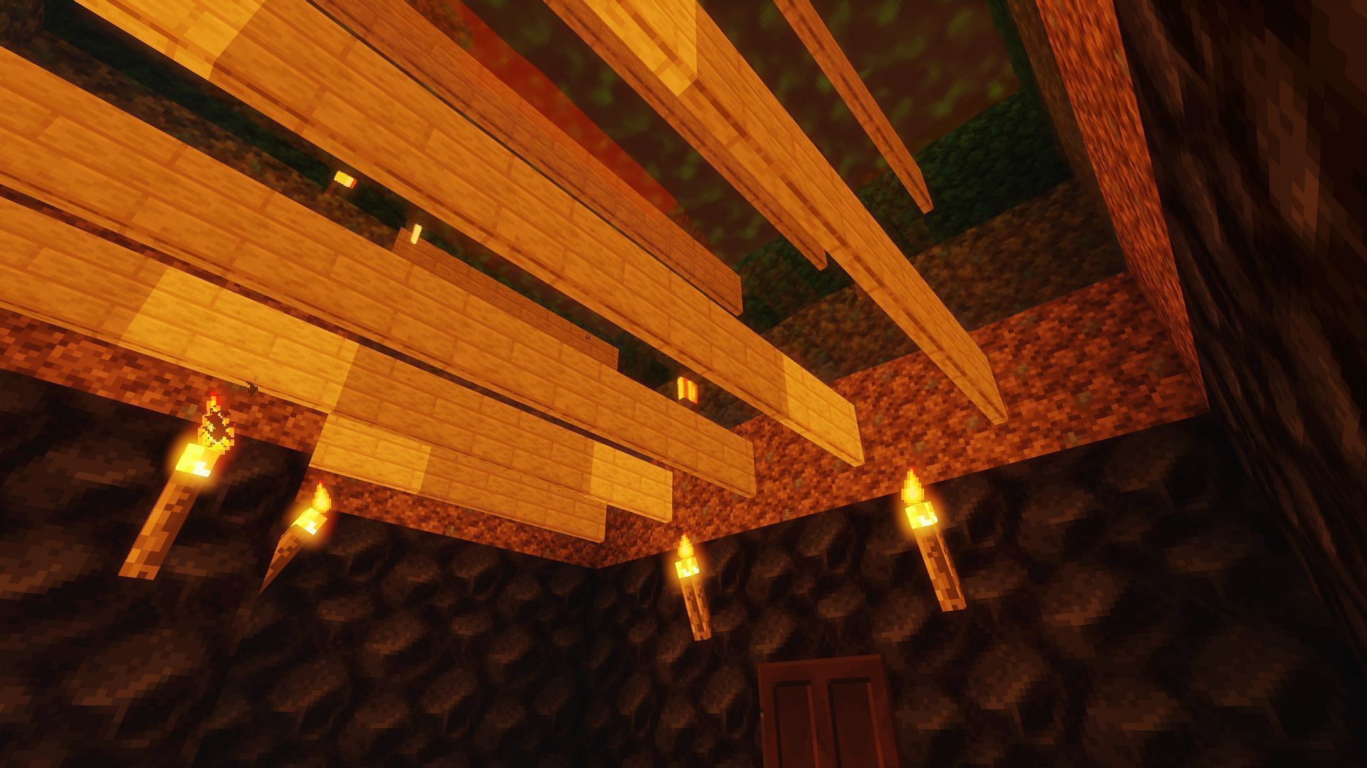 An example base entrance with a lave roof that players can drop through (Image via Minecraft)
