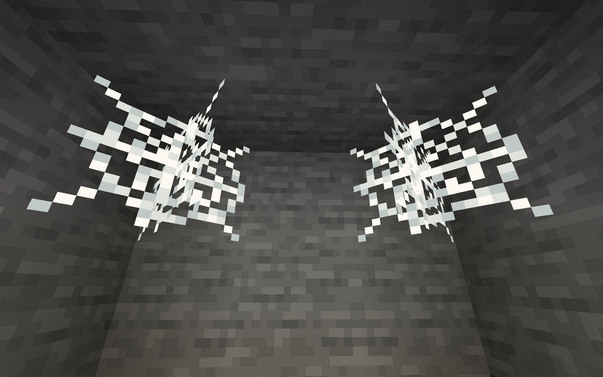 Cobwebs in mineshaft (Image via Minecraft)