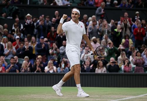 Roger Federer celebrates match point in his Men's Singles Fourth Round match against Lorenzo Sonego