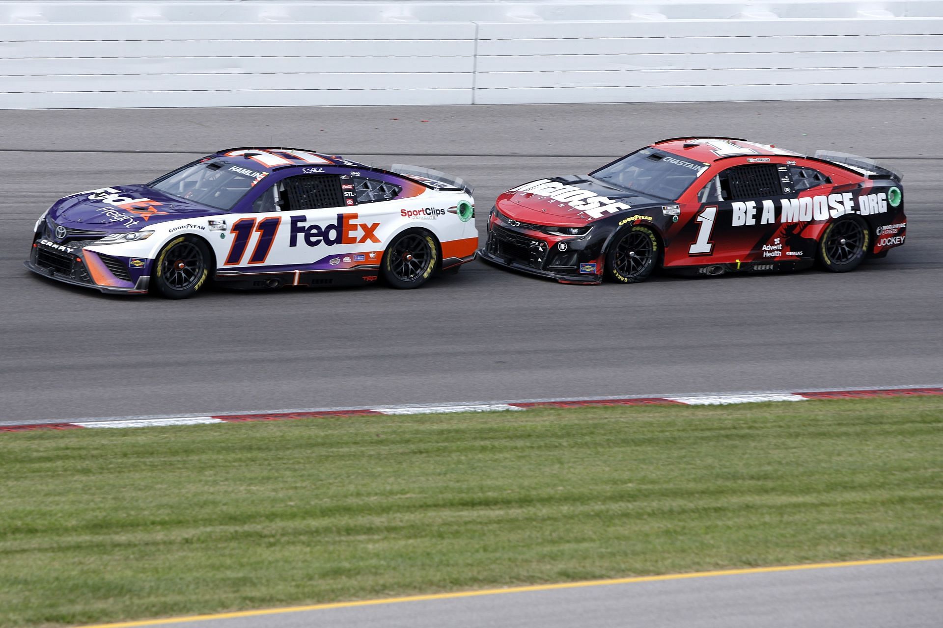 Denny Hamlin (#11) and Ross Chastain (#1) race during the 2022 NASCAR Cup Series Enjoy Illinois 300 at WWT Raceway (Photo by Sean Gardner/Getty Images)