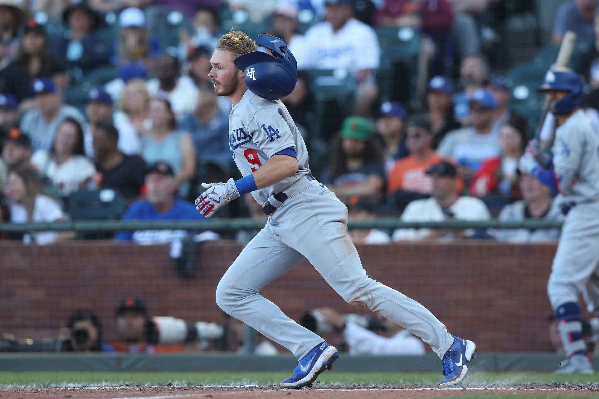 Los Angeles Dodger Gavin Lux hits a single against the San Francisco Giants.
