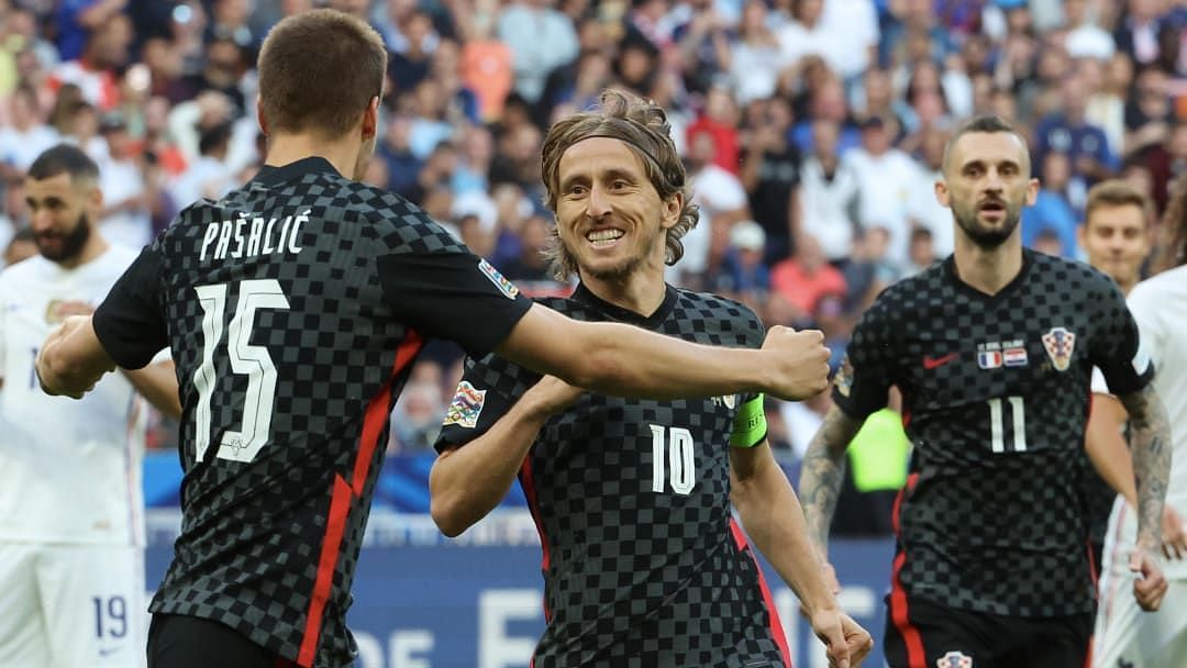 Luka Modric celebrates after scoring an early penalty to put Croatia up on the night.