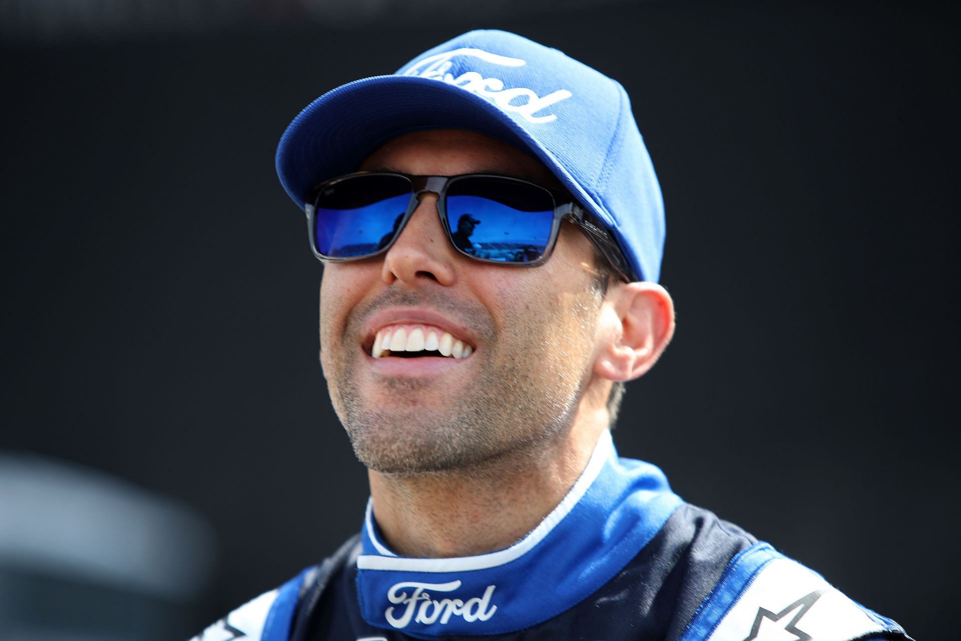 Aric Almirola looks on during qualifying for the NASCAR Cup Series Enjoy Illinois 300 at WWT Raceway