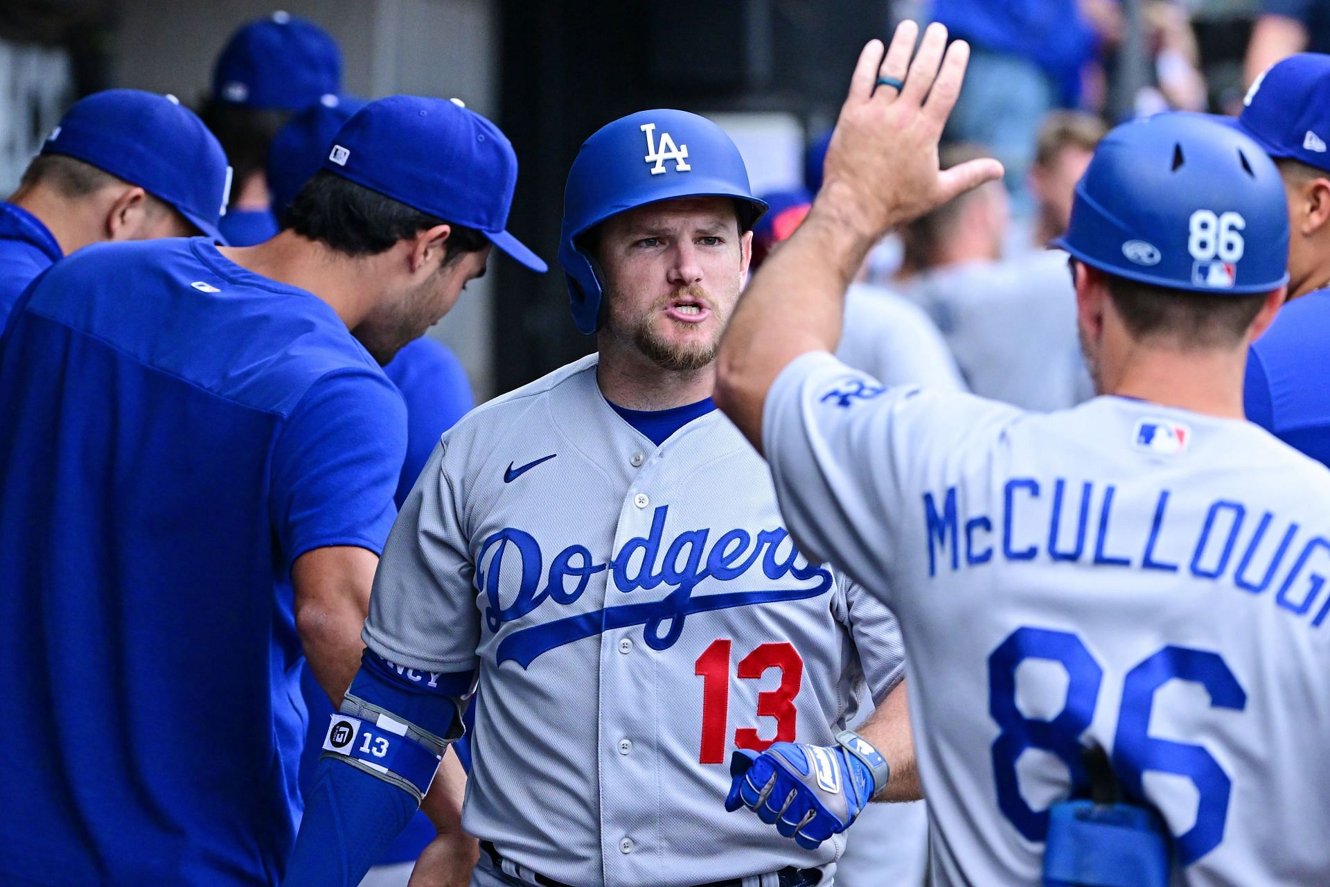 Max Muncy is greeted by teammates in the dugout during last week&#039;s Los Angeles Dodgers v Chicago White Sox game.