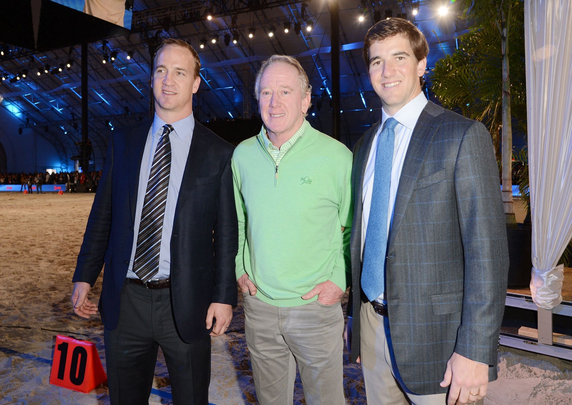 Peyton (l), Archie (c), and Eli at a celebrity event