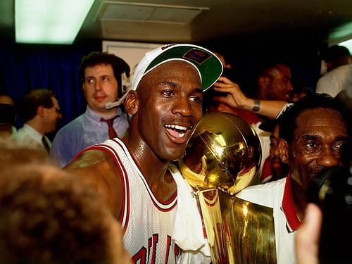 Michael Jordan with the NBA trophy