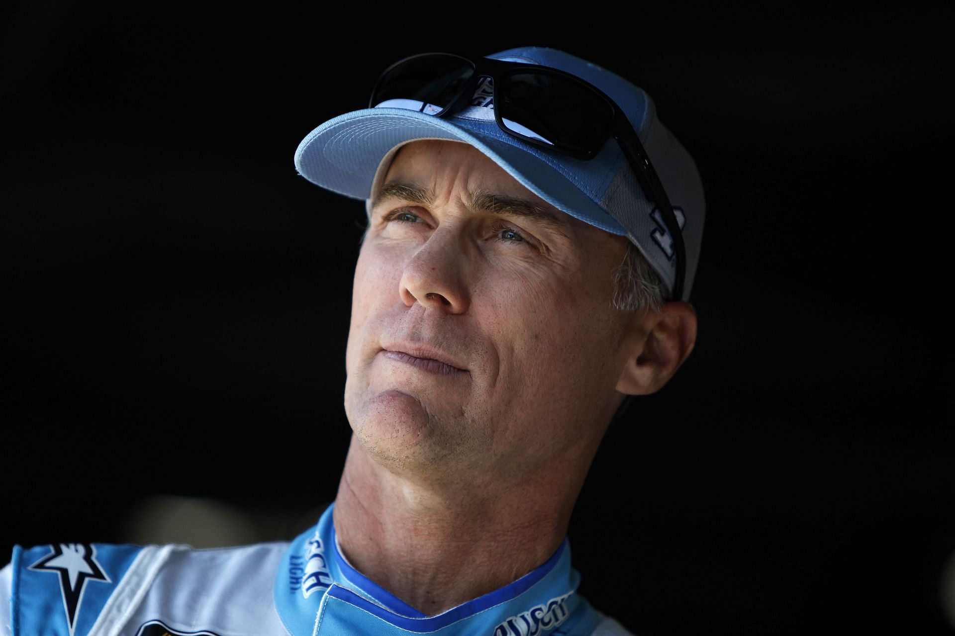 Kevin Harvick waits in the garage area during practice for the NASCAR Cup Series Enjoy Illinois 300 at WWT Raceway