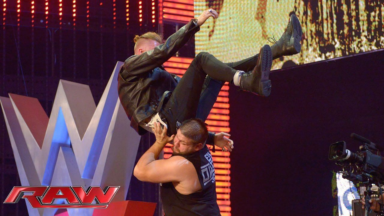 WWE Superstar tosses Machine Gun Kelly off a stage on Raw