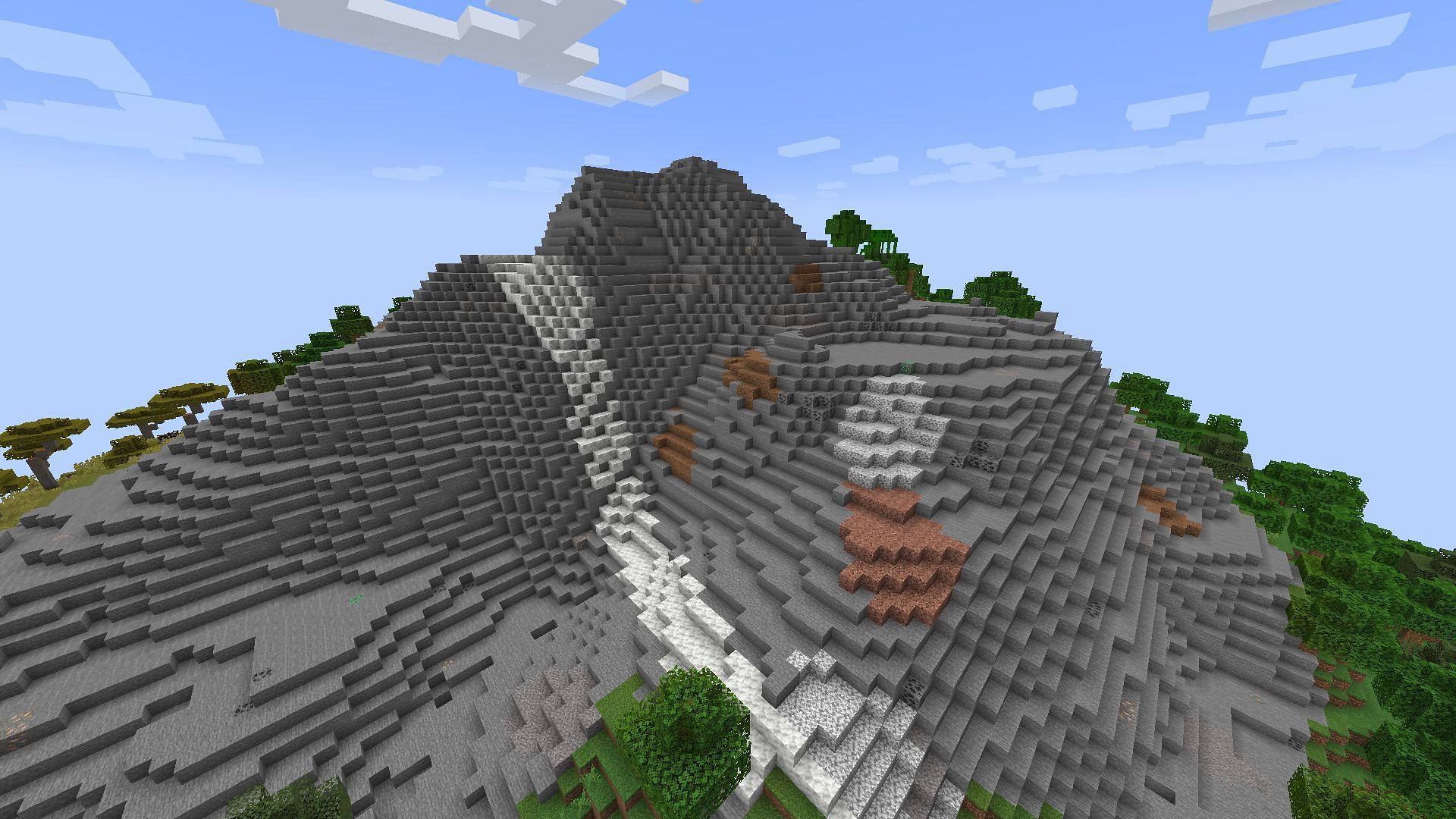 Iron is most commonly found in the mountains (Image via Mojang)