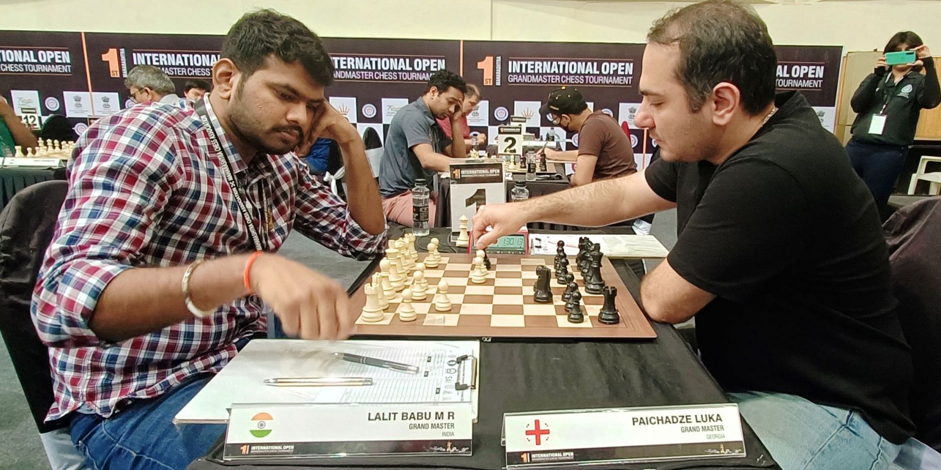 Grandmaster MR Lalith Babu (L) makes a move against GM Luka Paichadze in the fifth round in Pune on Friday.(Pic credit: AICF)
