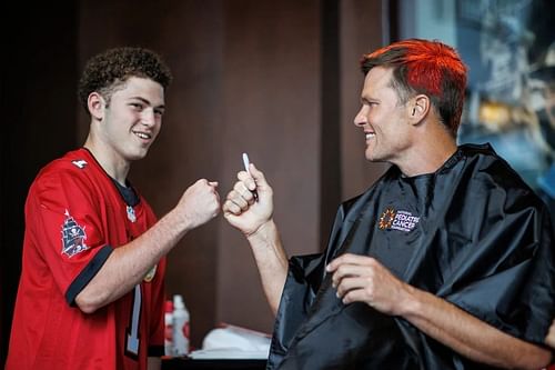 Tom Brady sporting orange hair | Image Credit: Tampa Bay Buccaneers