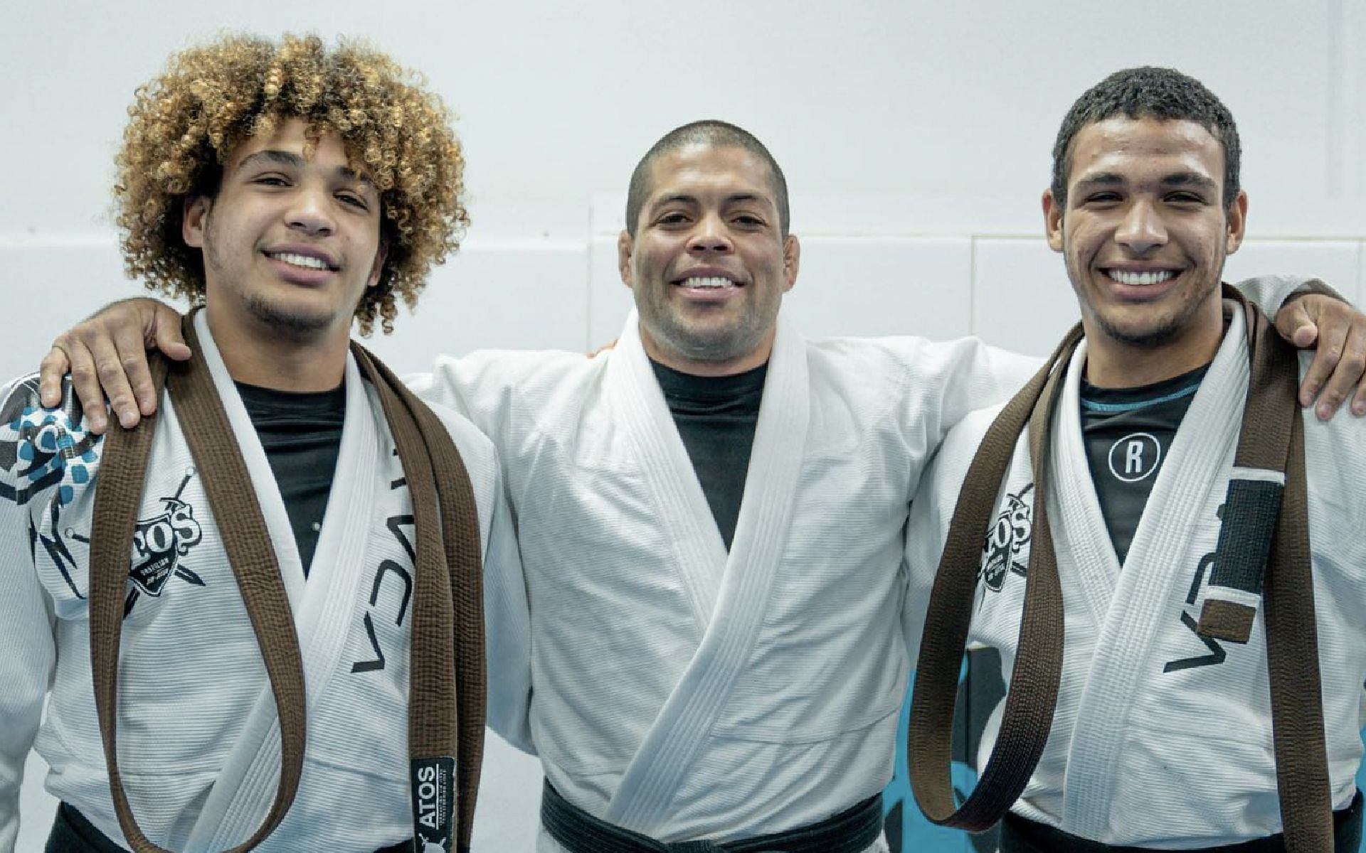 Twins Kade Ruotolo (left) and Tye Ruotolo (right) along with their mentor Andre Galvao (center). [Photo Andre Galvao Instagram]