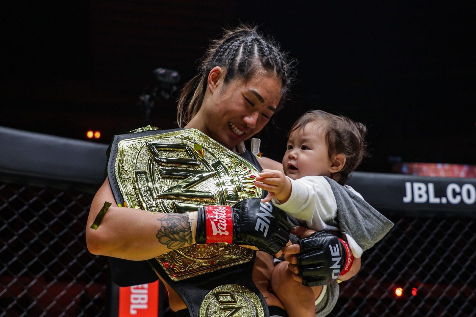 Angela Lee with her daughter Ava Marie at ONE X [Photo Credit: ONE Championship]