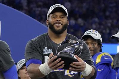 Rams star Aaron Donald lands a $95M contract restructure that now pays him  like a QB