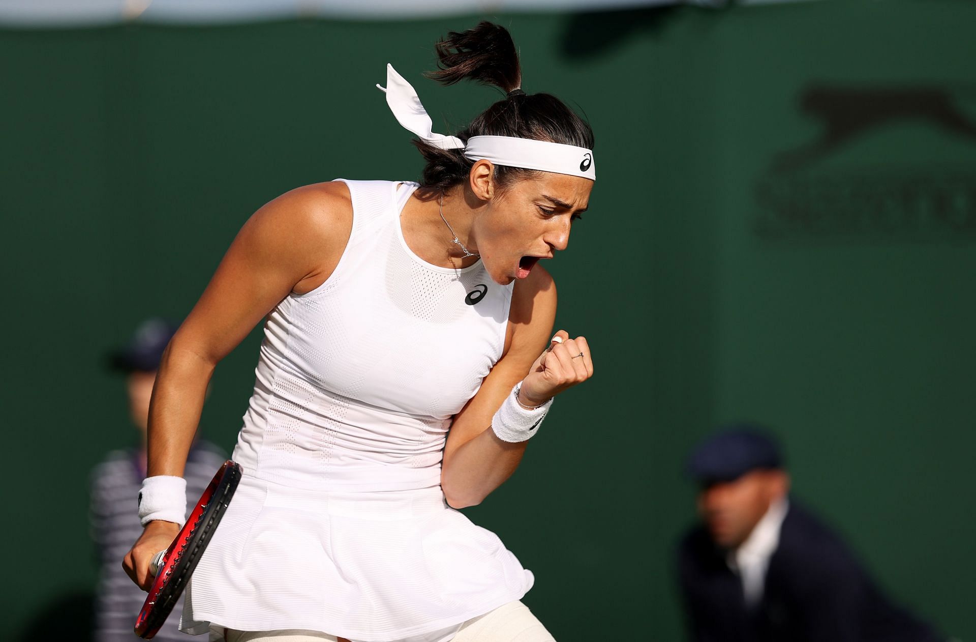 Caroline Garcia exults during her first-round match at the 2022 Wimbledon Championships