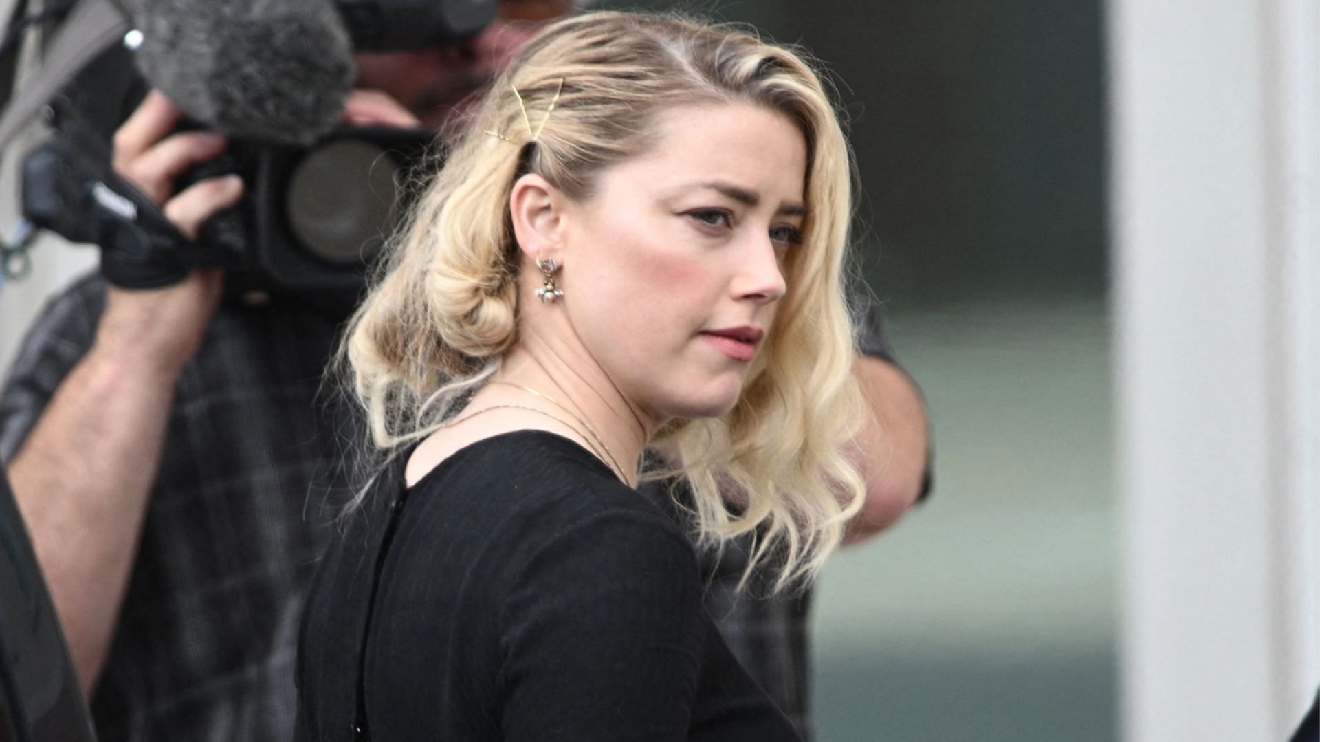 Amber Heard was ordered to pay $10.35 million to Johnny Depp after he won the high-profile defamation case against her (Image via Getty Images/Brendan Smialowski)