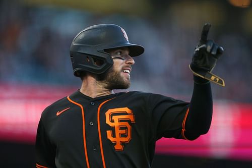 Luis Gonzalez of the San Francisco Giants hits a two-run double against the Philadelphia Phillies.