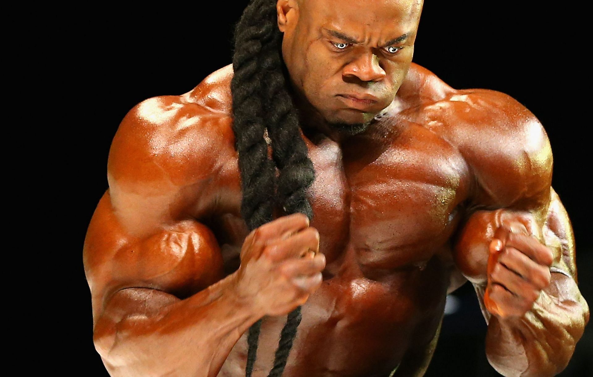 (Do these barbell exercises to get a strong chest like Kai Greene. Image via Getty/2016 Arnold Classic)