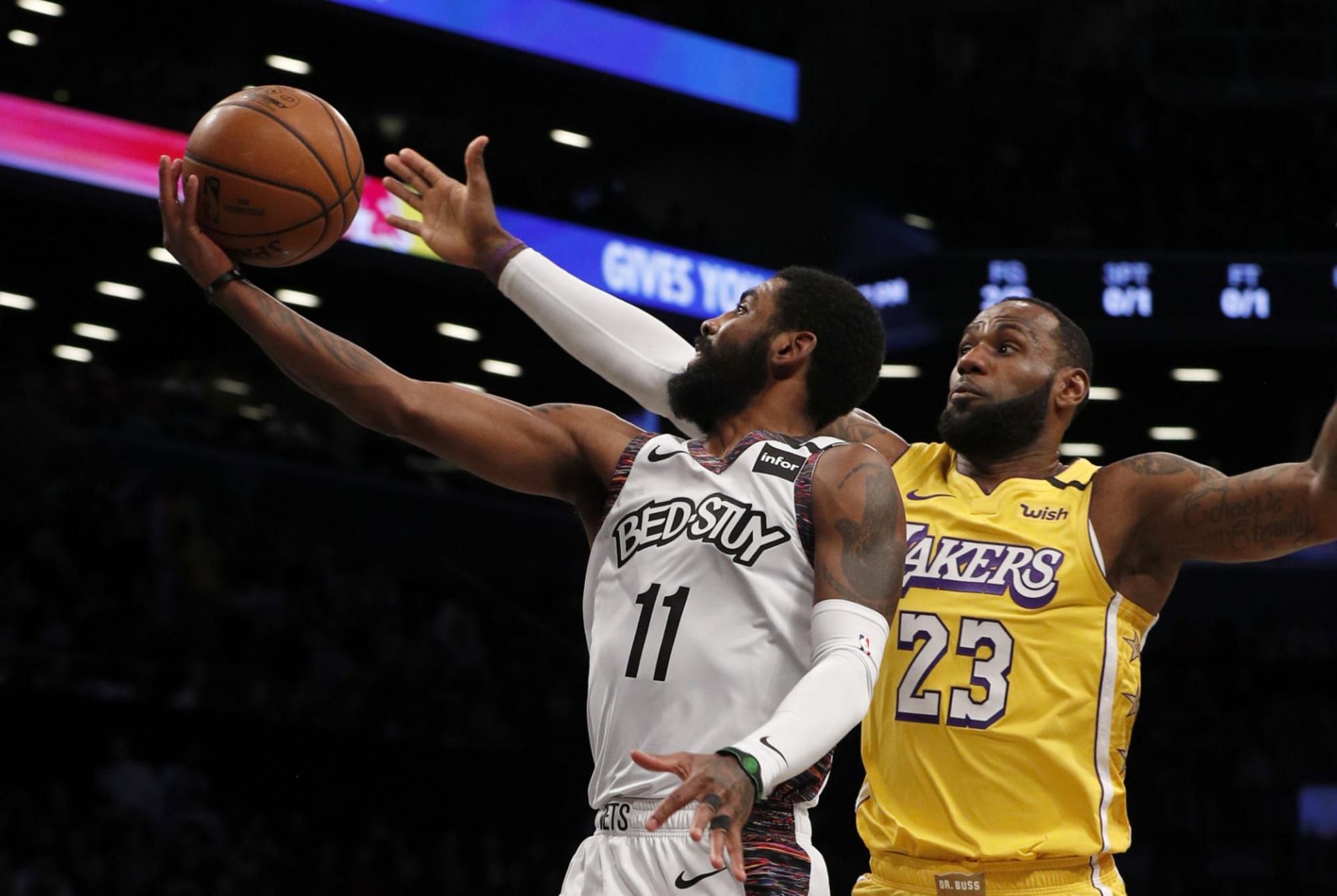 Kyrie Irving and LeBron James in action during an NBA game