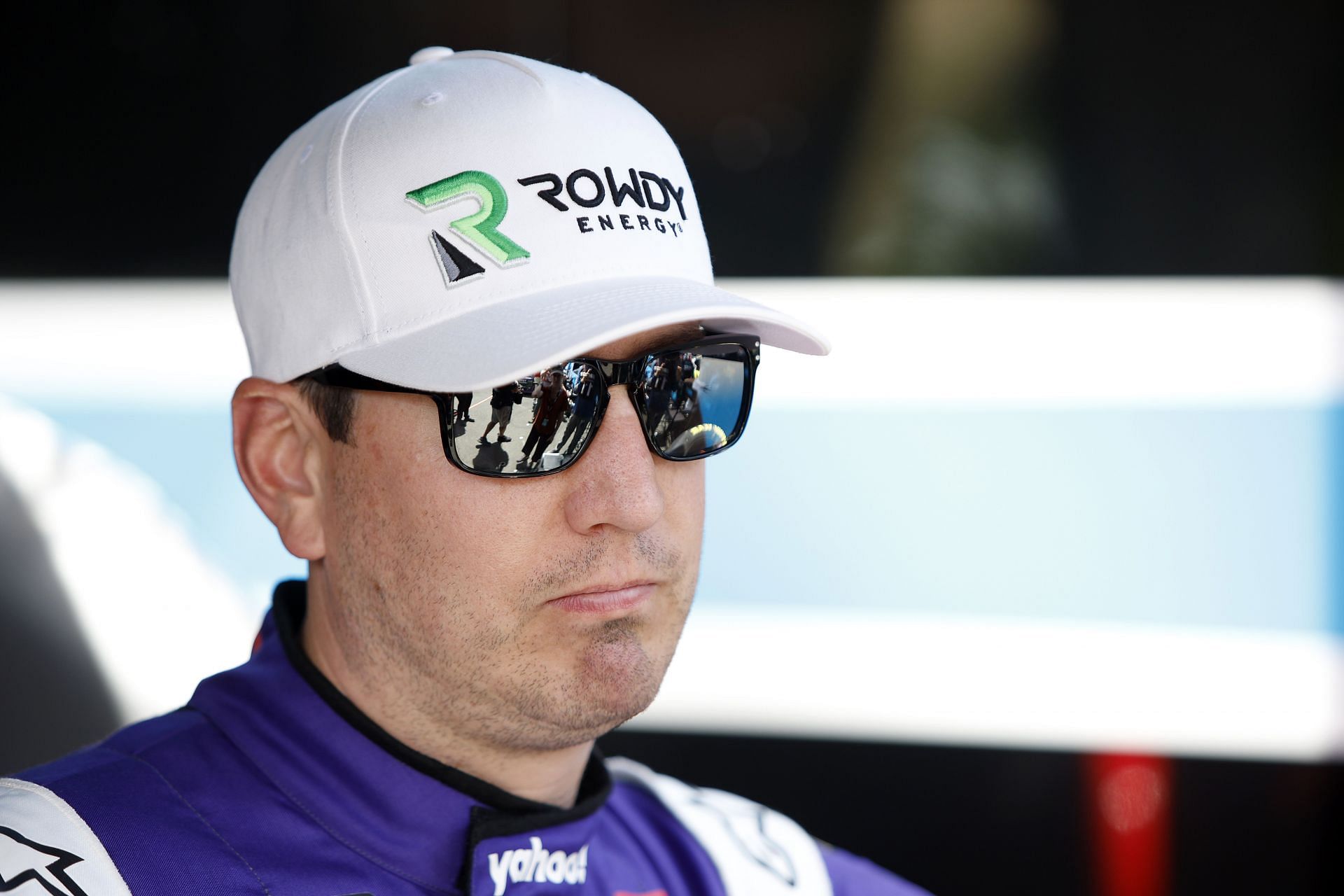 Kyle Busch waits in the garage area during practice for the NASCAR Camping World Truck Series DoorDash 250 at Sonoma Raceway