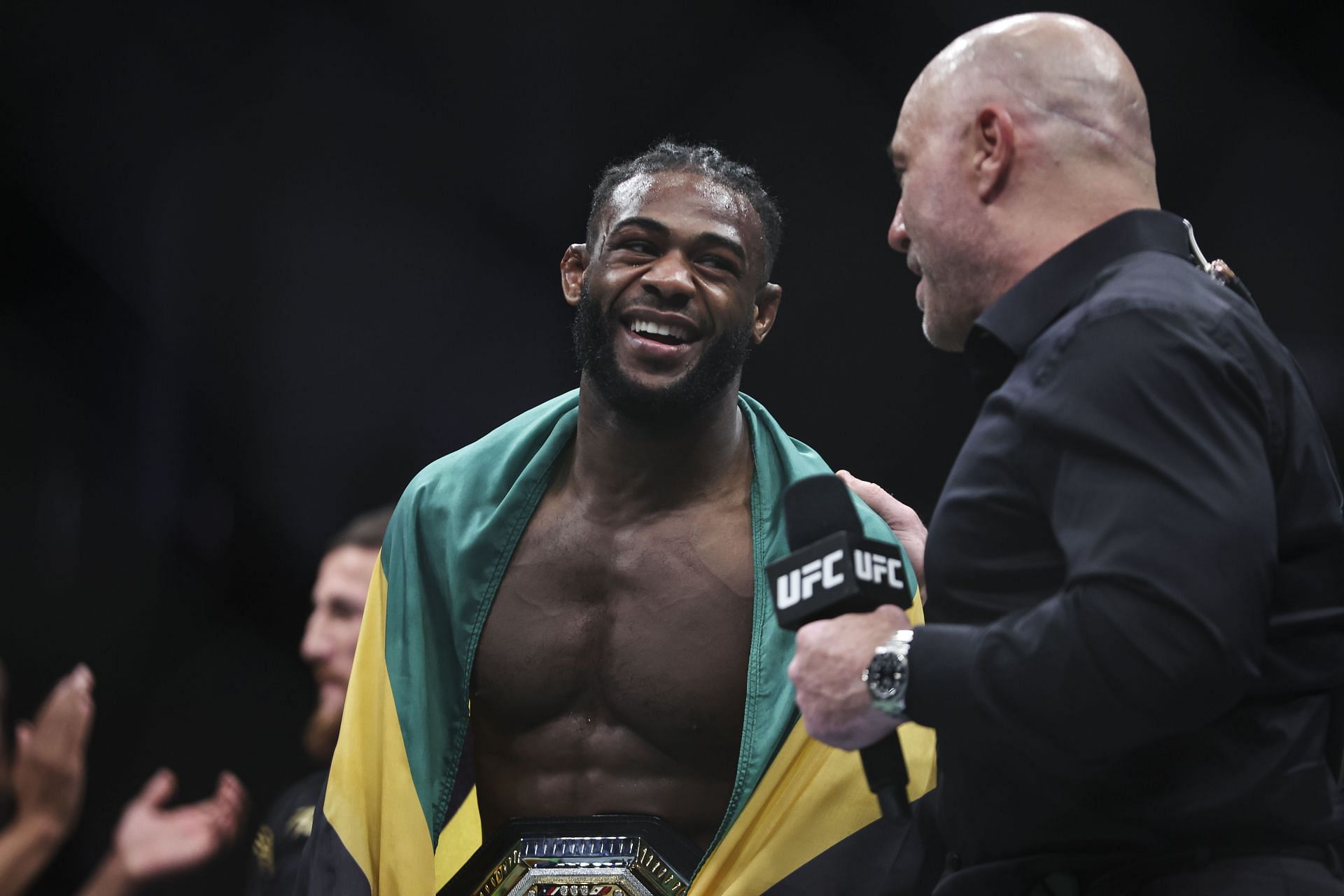 UFC 273: Volkanovski v The Korean Zombie Zombie, Aljamain Sterling (left), Joe Rogan (right)