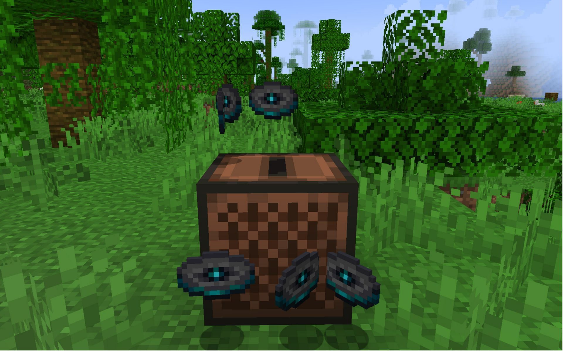 Various iterations of the &quot;5&quot; music disc and a jukebox (Image via Minecraft)