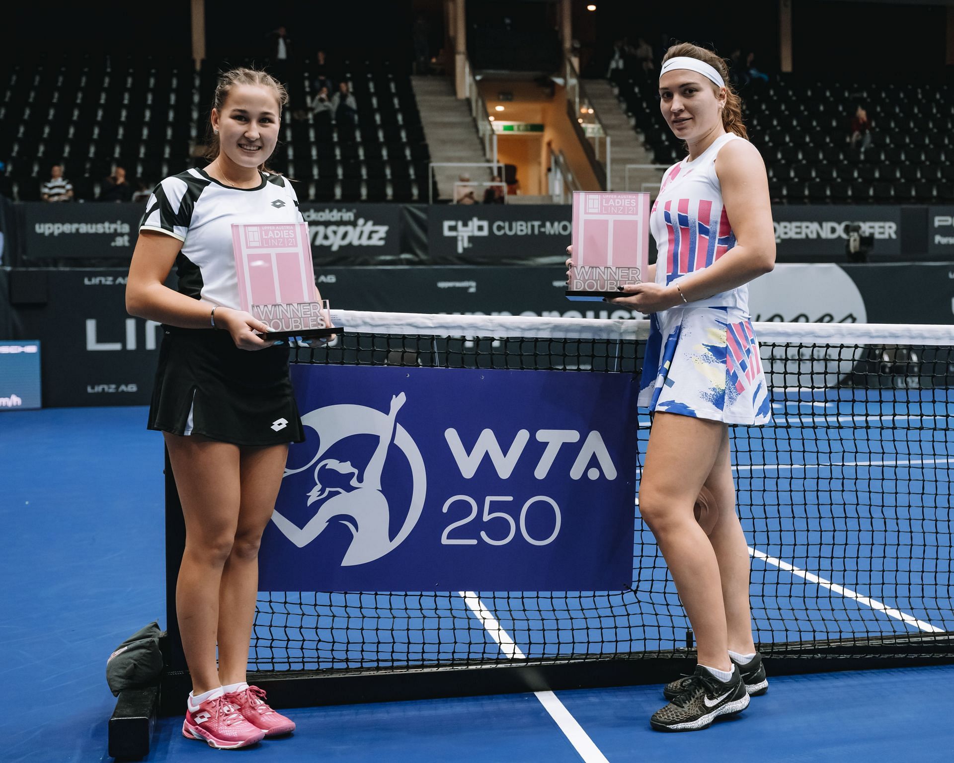 Natela Dzalamidze (right) will compete at the 2022 Wimbledon after taking citizenship in Georgia