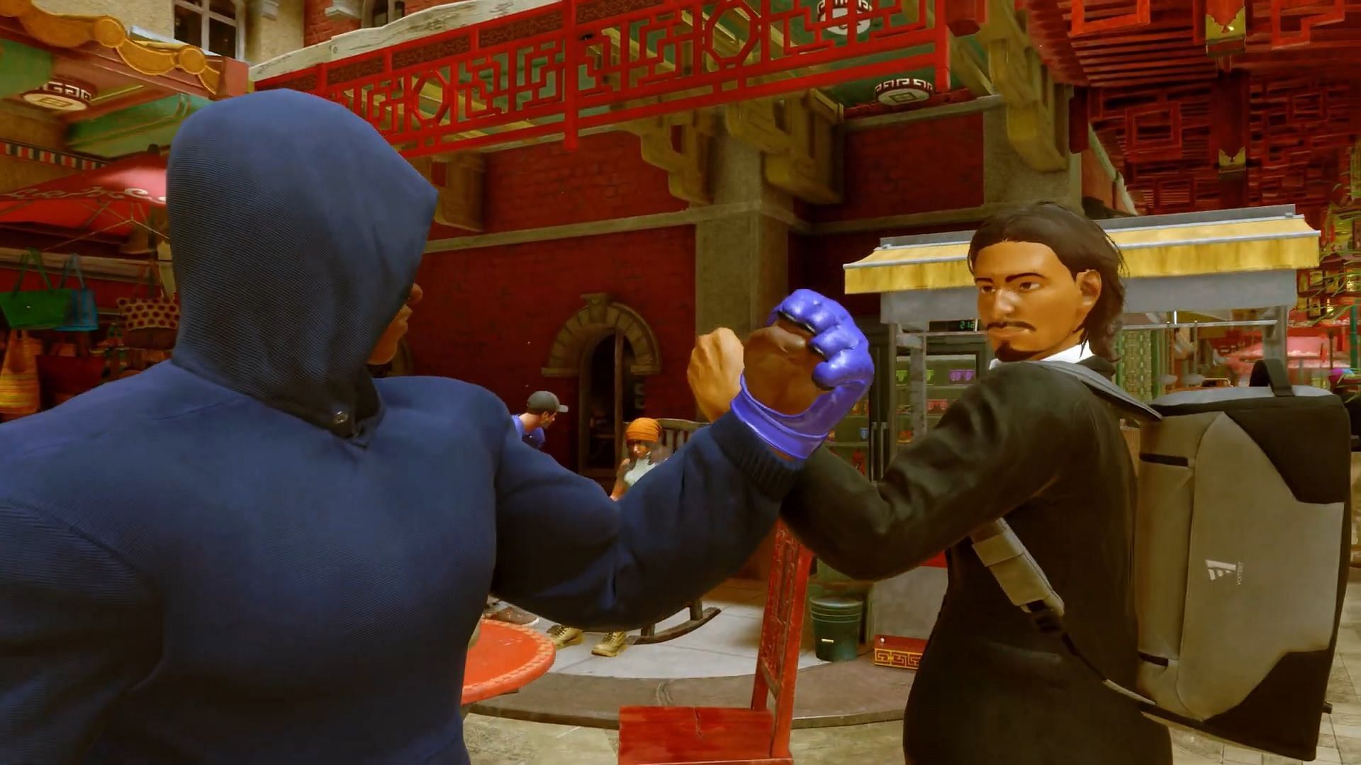 The hooded figure is possibly a player character (Image via Capcom)