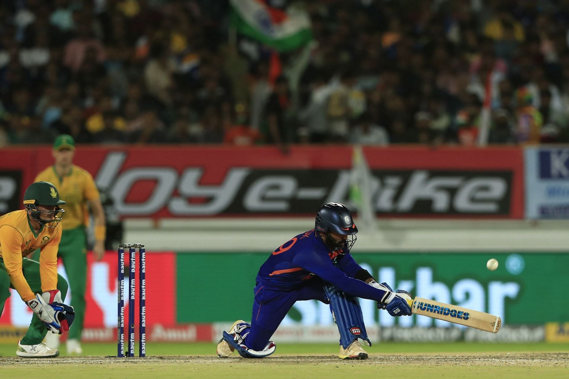 Dinesh Karthik plays a sweep during the fourth T20I. Pic: Getty Images