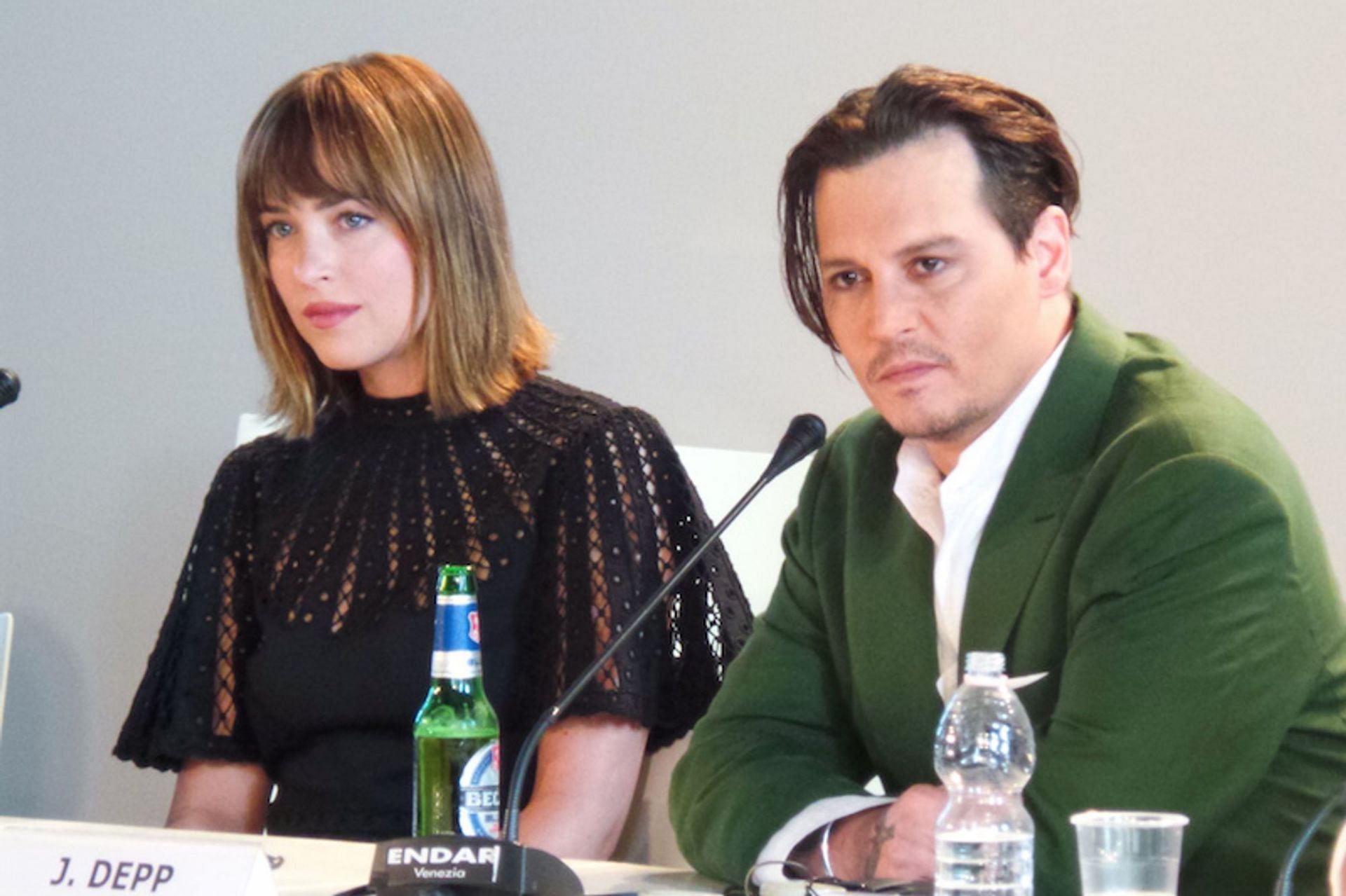 Dakota Johnson reacts to viral TikTok clip of her and Johnny Depp (Image via Getty Images)