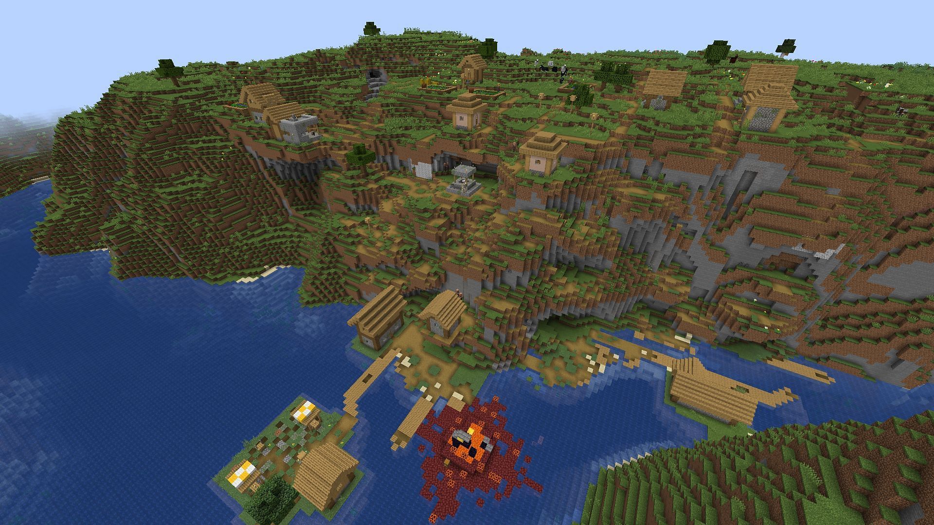 The first large village near spawn, with a ruined portal (Image via Minecraft)