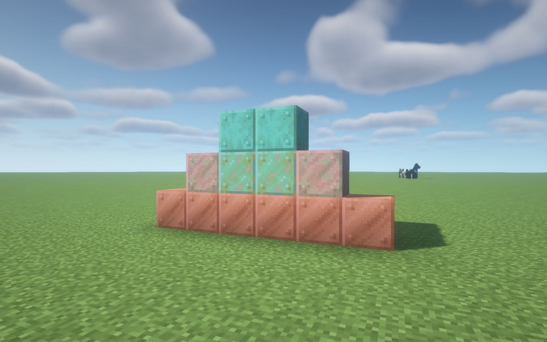 Copper blocks gradually oxidizing (Image via Mojang)