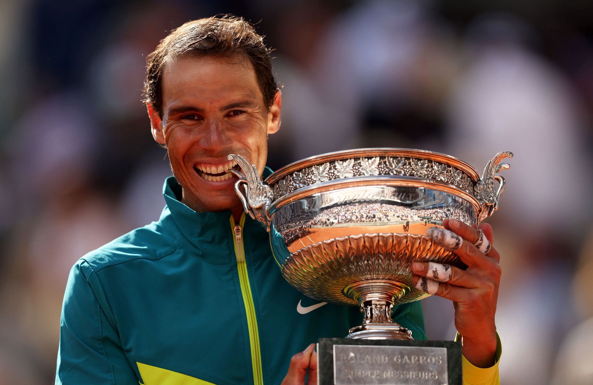 Rafael Nadal poses with his 14th French Open title.
