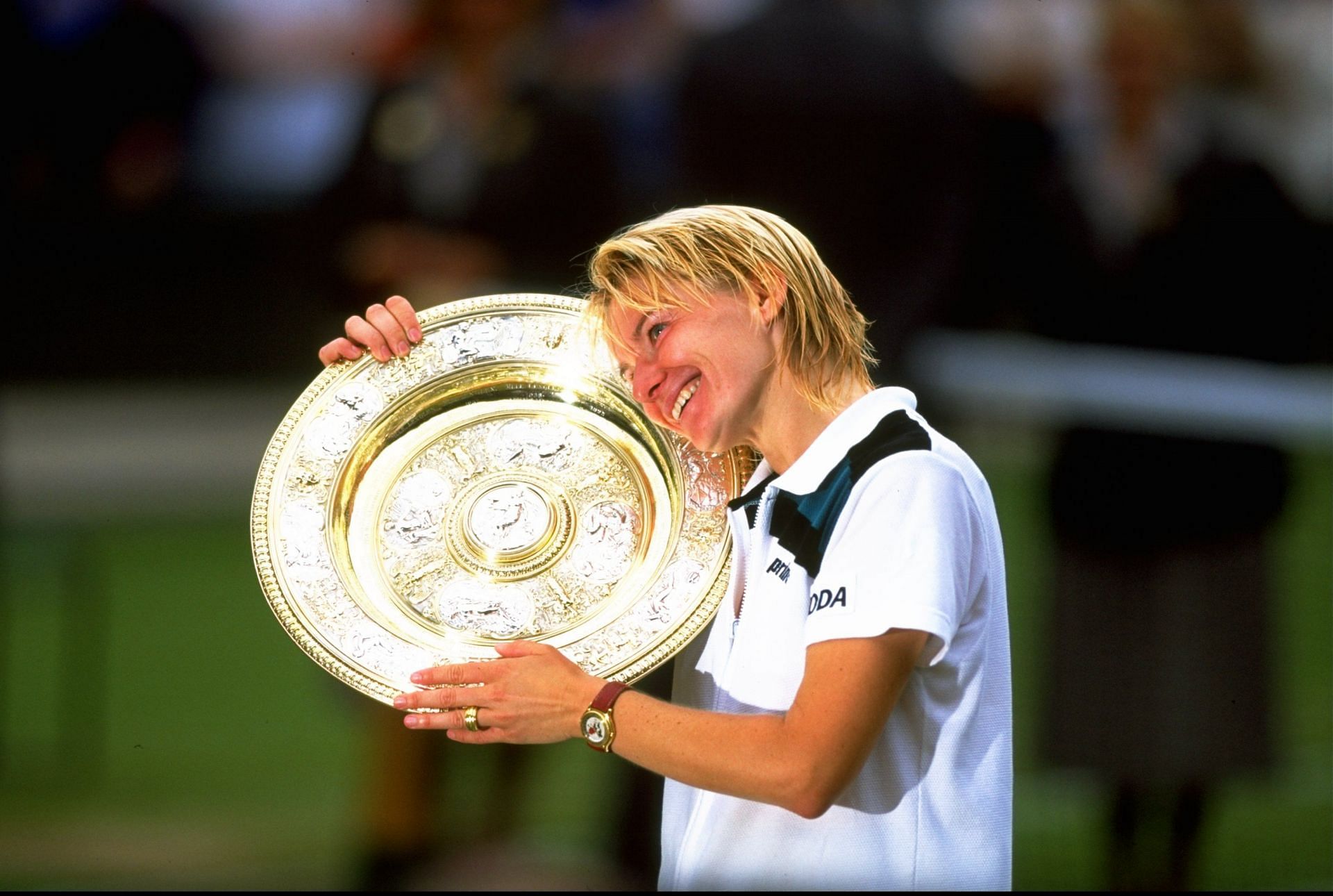 Jana Novotna of the Czech Republic poses with her trophy