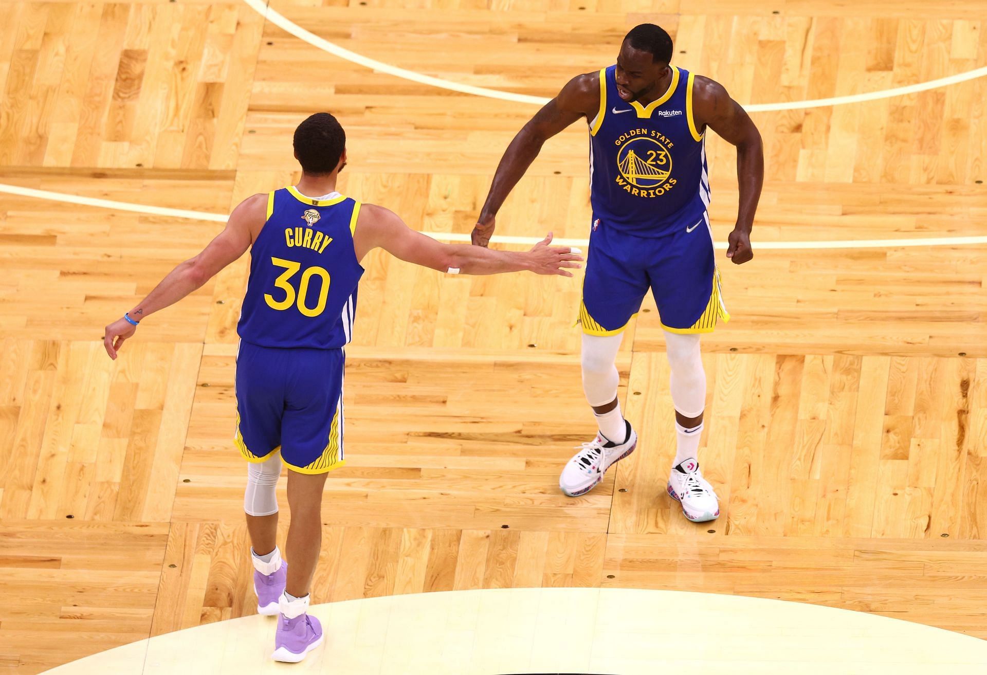 Steph Curry and Draymond Green in action