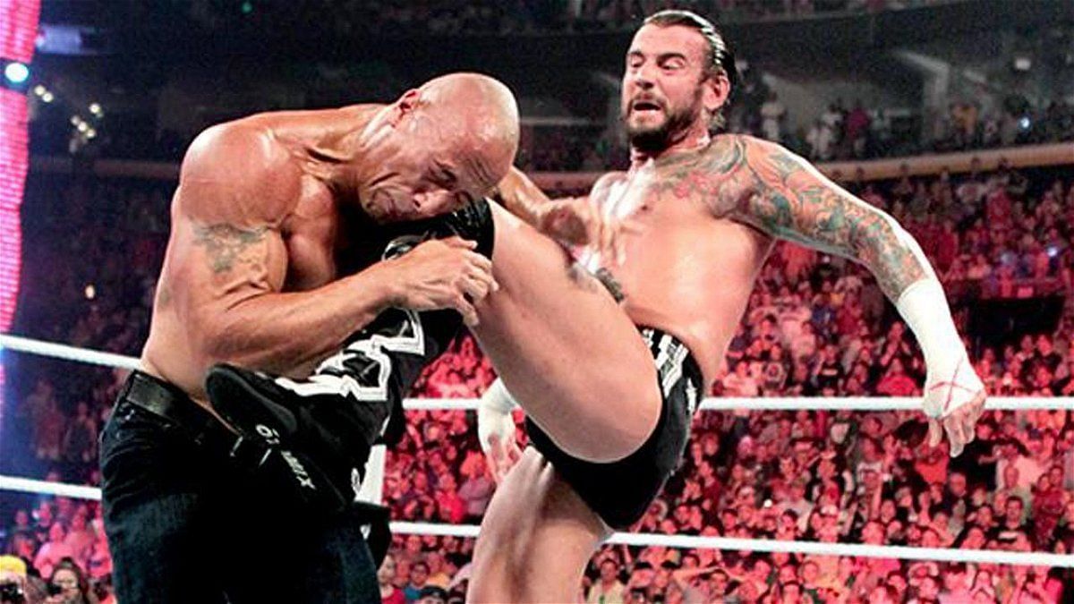 CM Punk turning on The Rock at RAW 1000.
