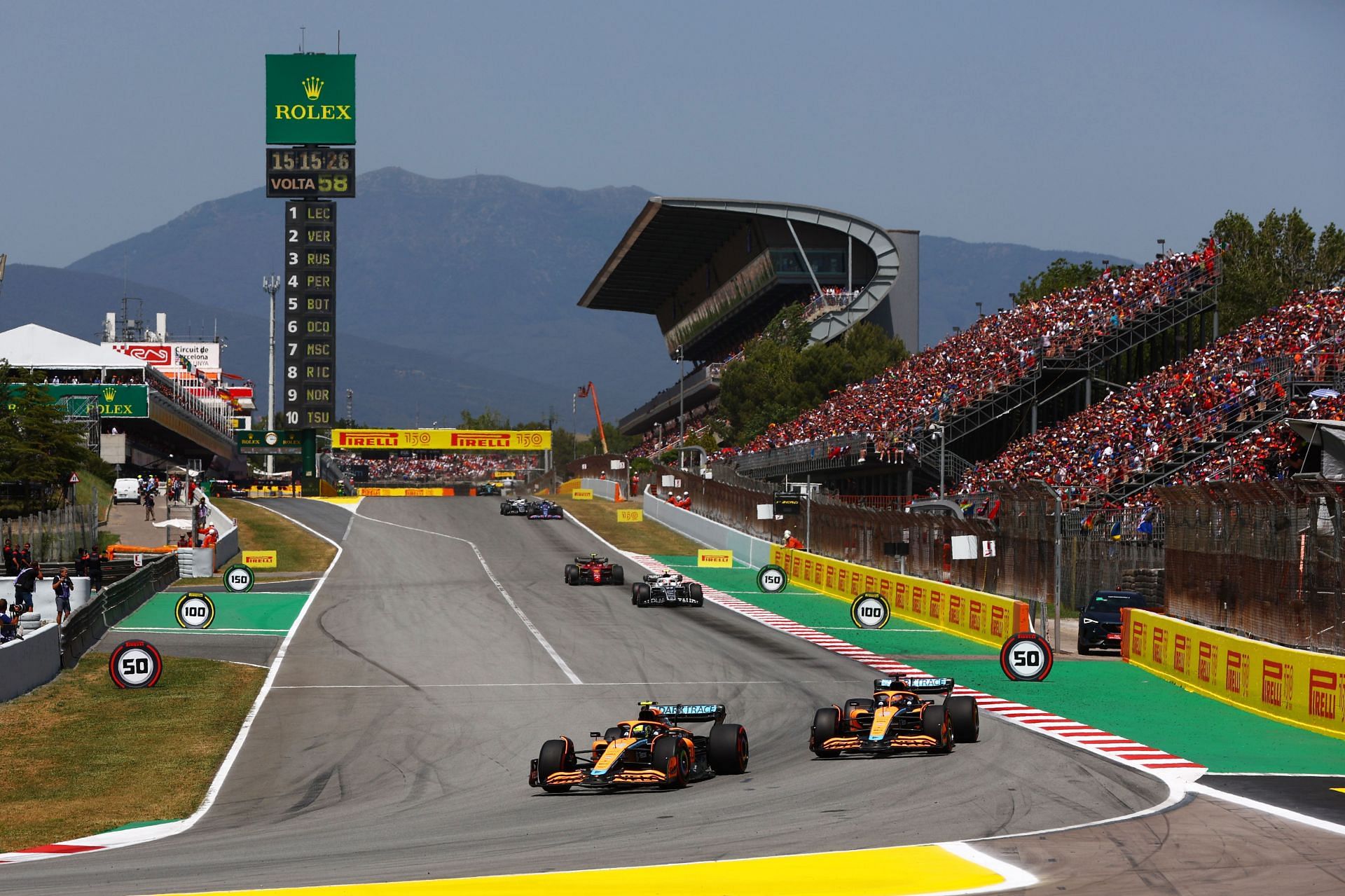 Lando Norris leading Daniel Ricciardo during the 2022 F1 Spanish GP (Photo by Mark Thompson/Getty Images)