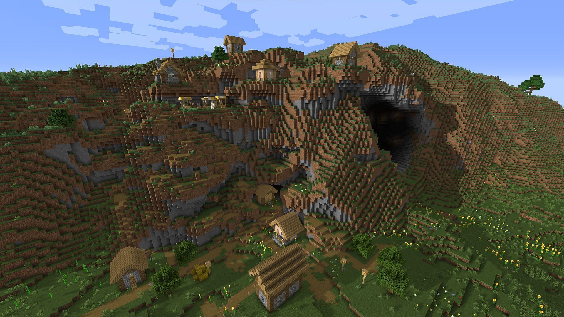 The cliff side village found near spawn (Image via Minecraft)