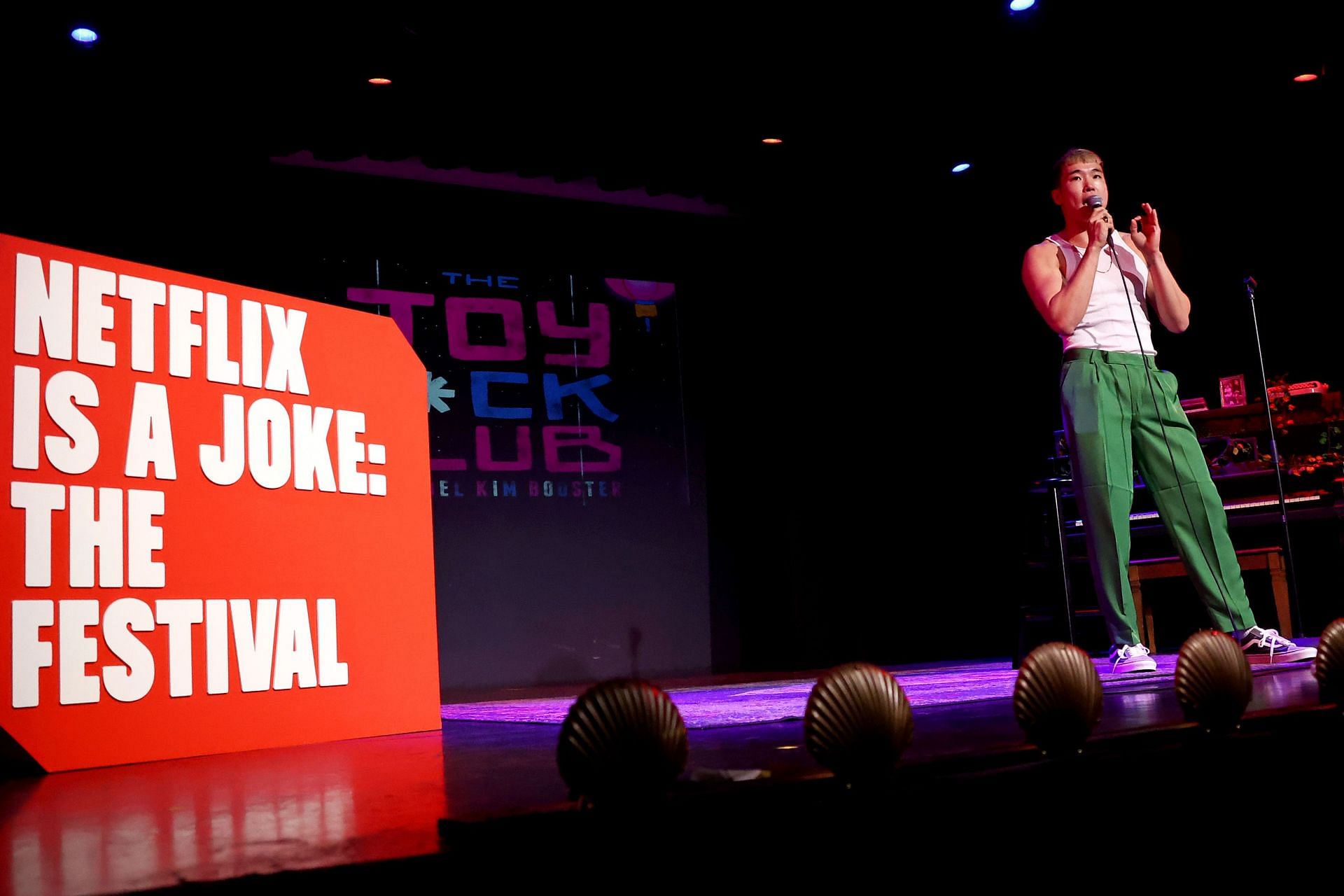 Joel Kim Booster performing live on stage (Image via Tommaso Boddi/Netflix)