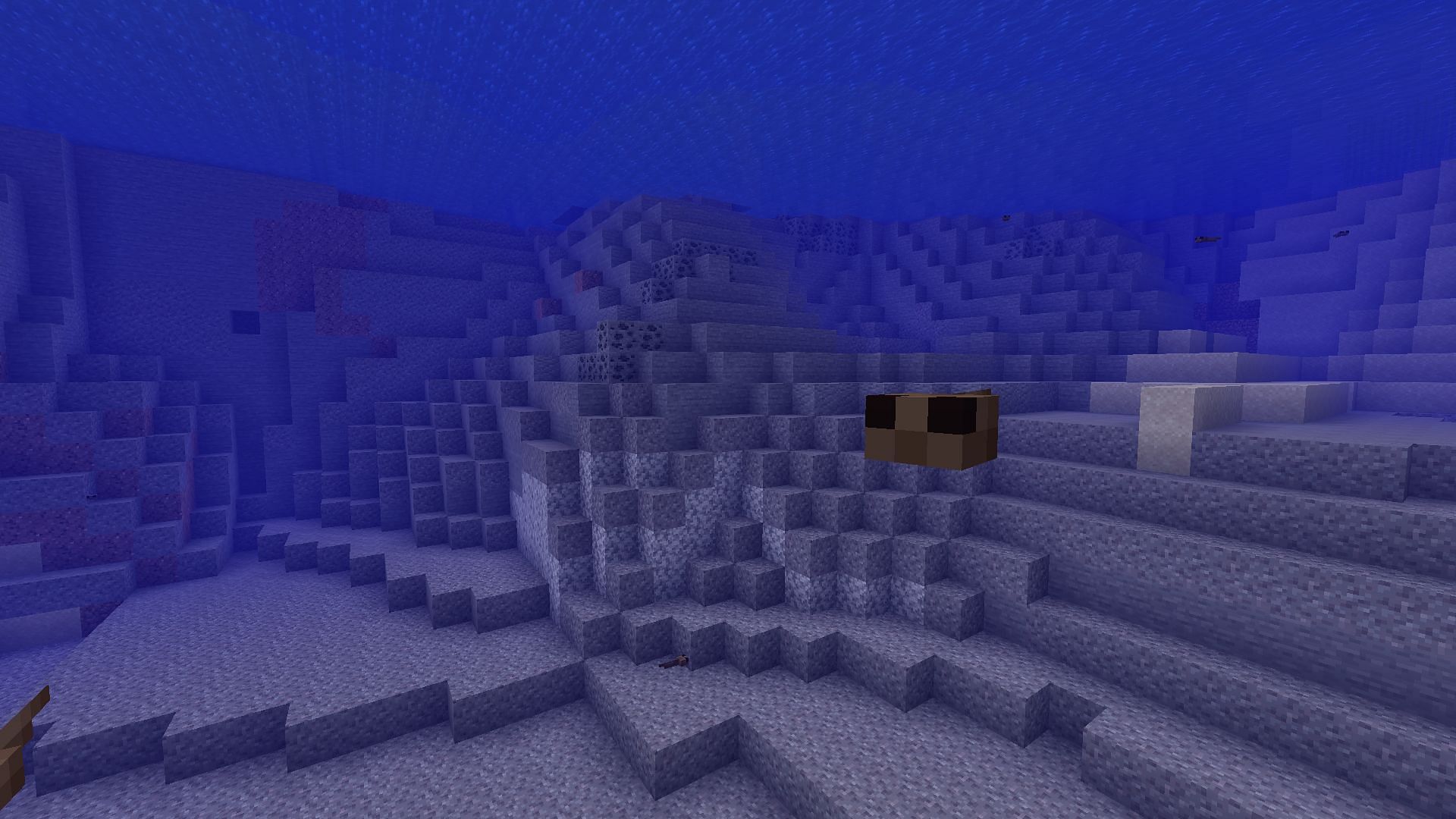 Tadpole spawning from frogspawn eggs (Image via Mojang)