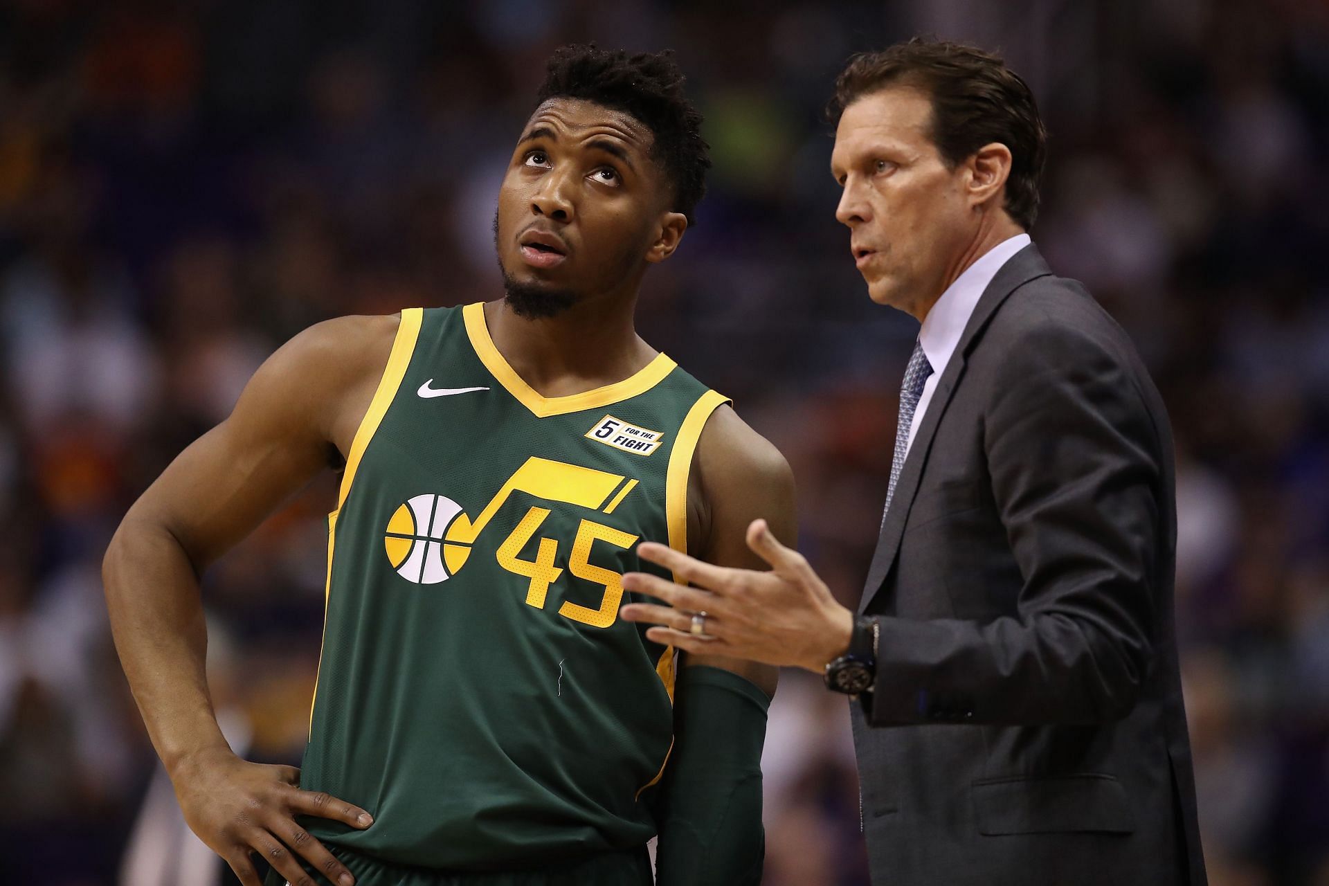 Donovan Mitchell in conversation with former head coach Quin Snyder