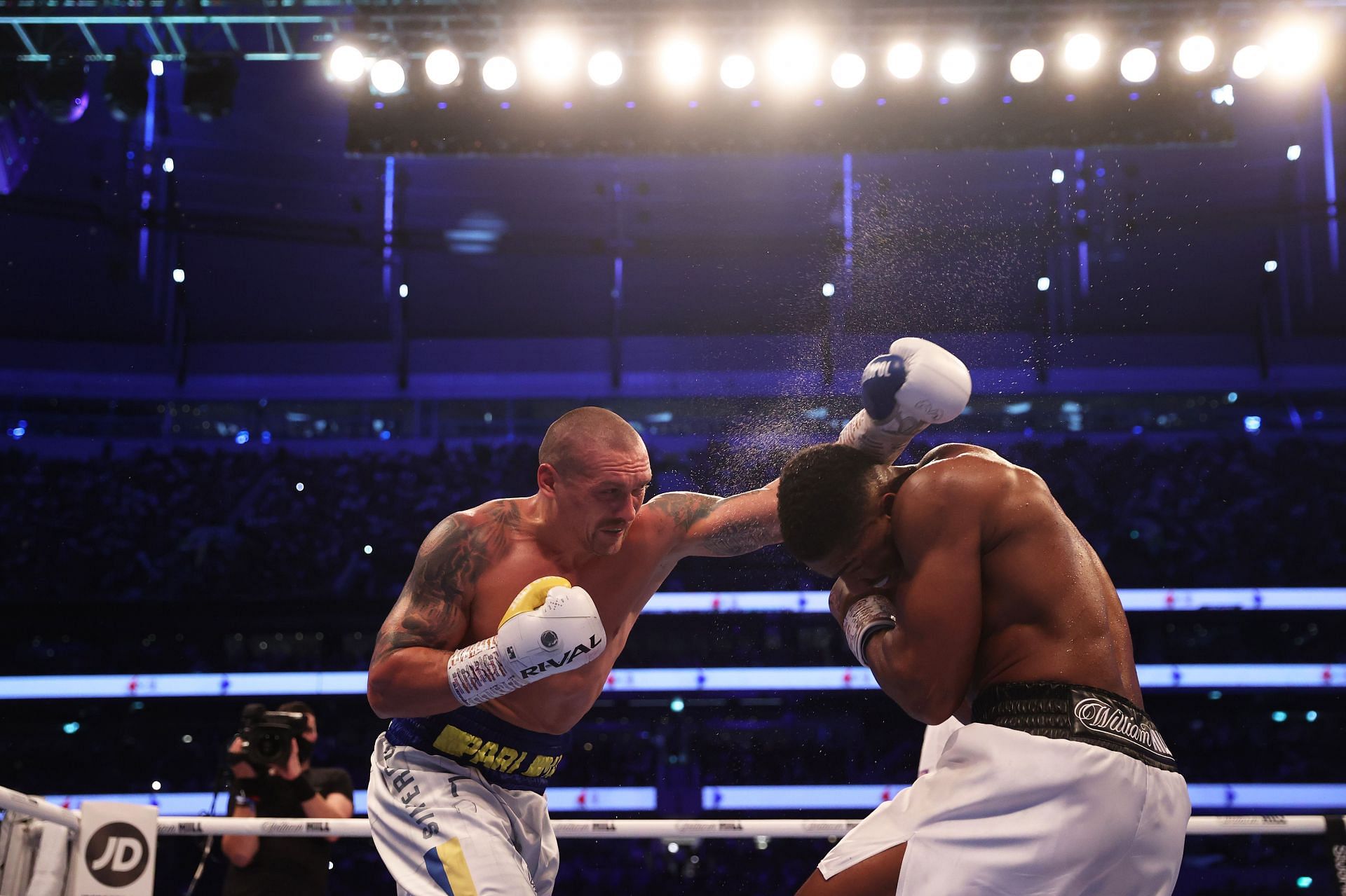 Oleksandr Usyk (left) during the first fight with Anthony Joshua (right)