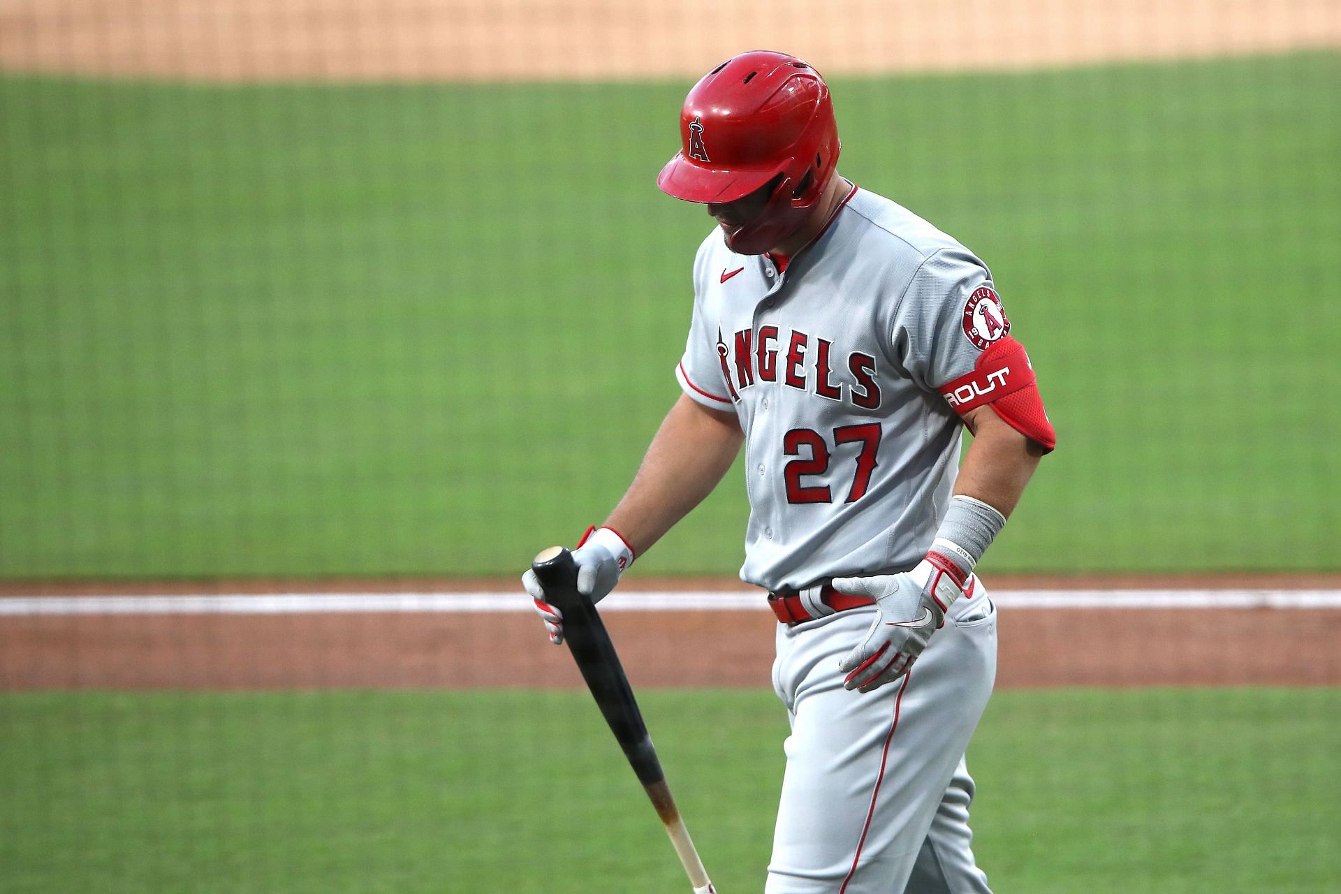 Mike Trout walks off field at Los Angeles Angels v San Diego Padres game.