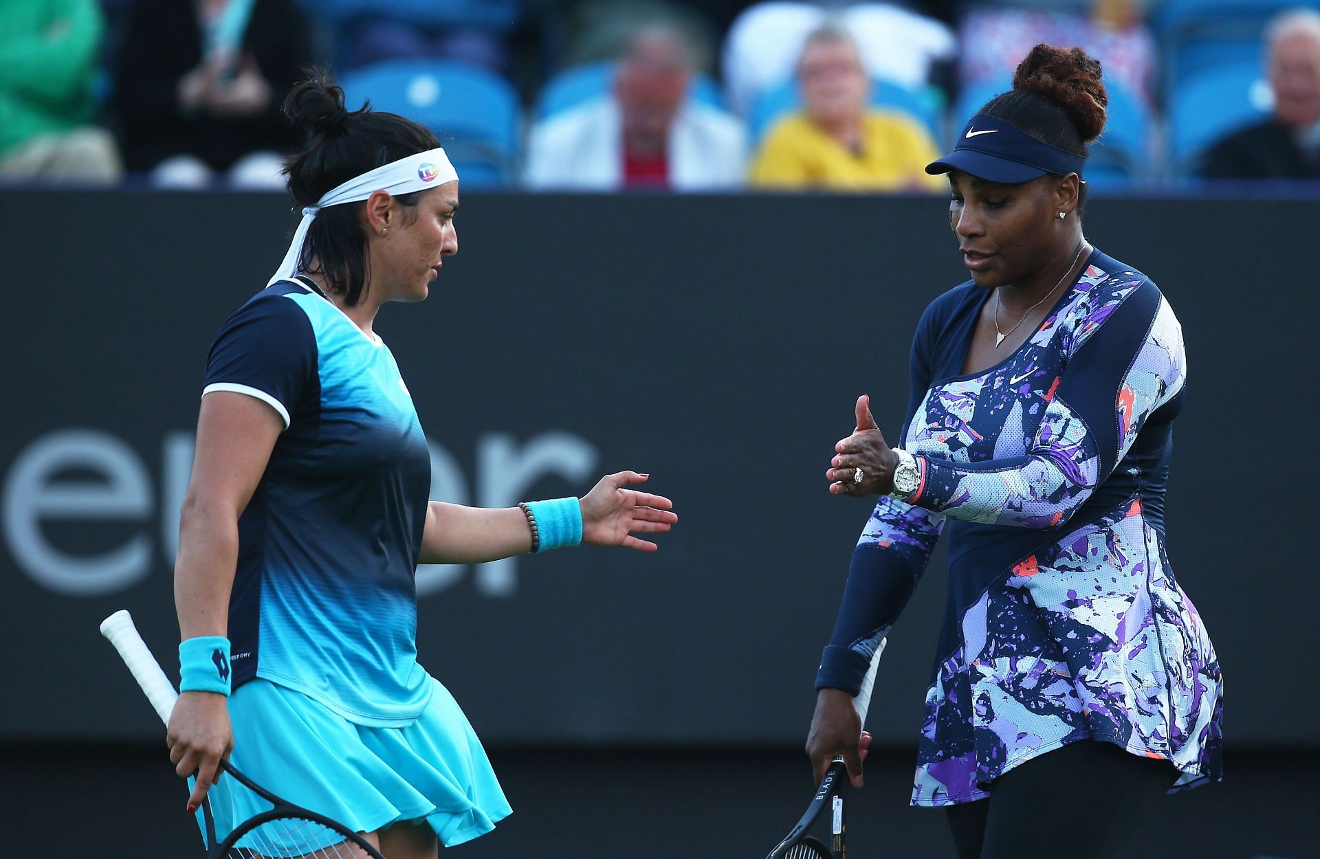Ons Jabeur and Serena Williams during their opening match in Eastbourne