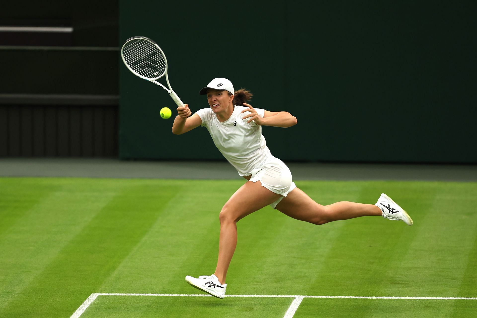 Iga Swiatek during a training session ahead of the 2022 Wimbledon Championships