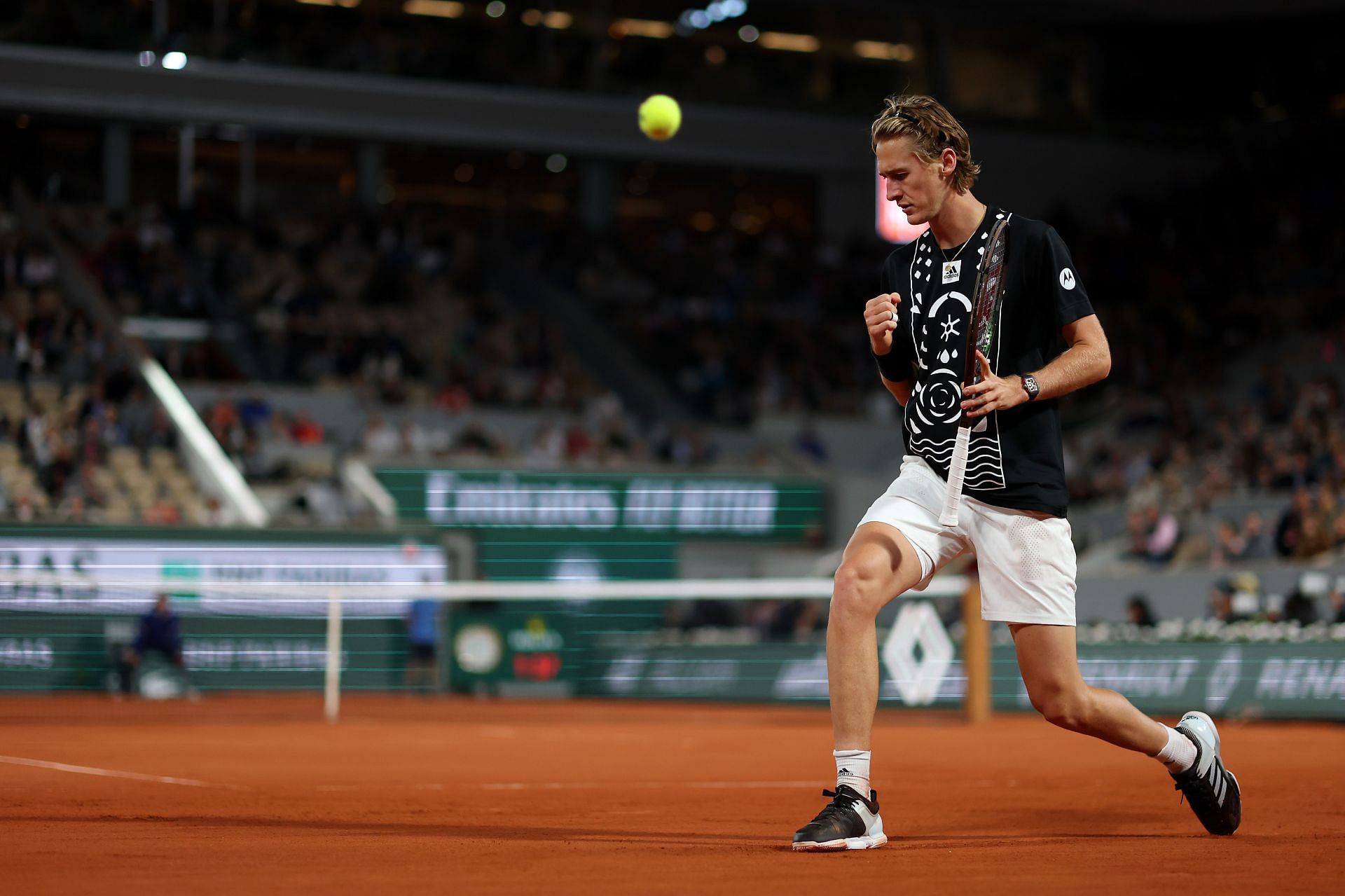 Sebastian Korda in action against Carlos Alcaraz of Spain at Roland Garros