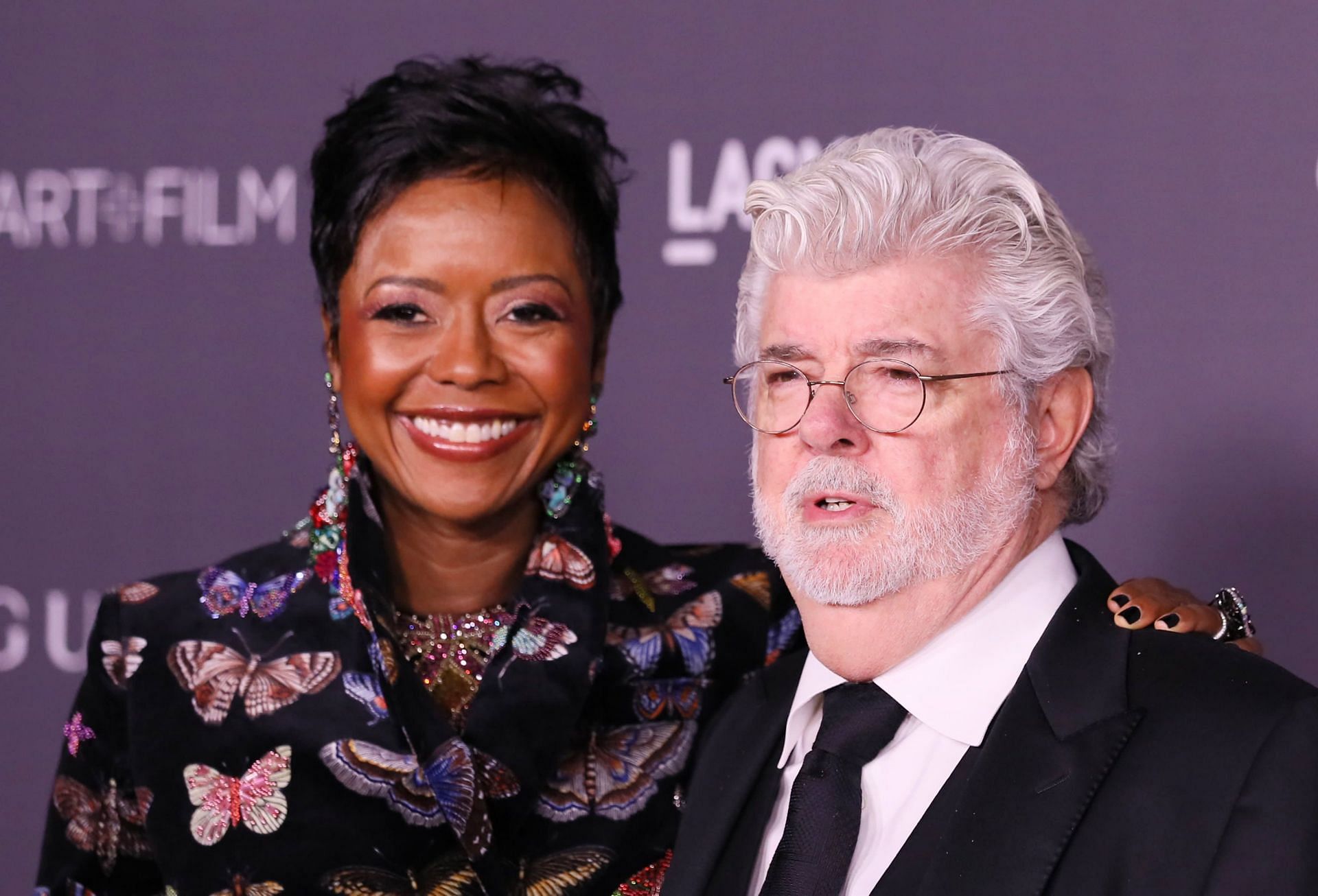 The Broncos co-woner with her husband, Star Wars creator George Lucas. Source: CNBC