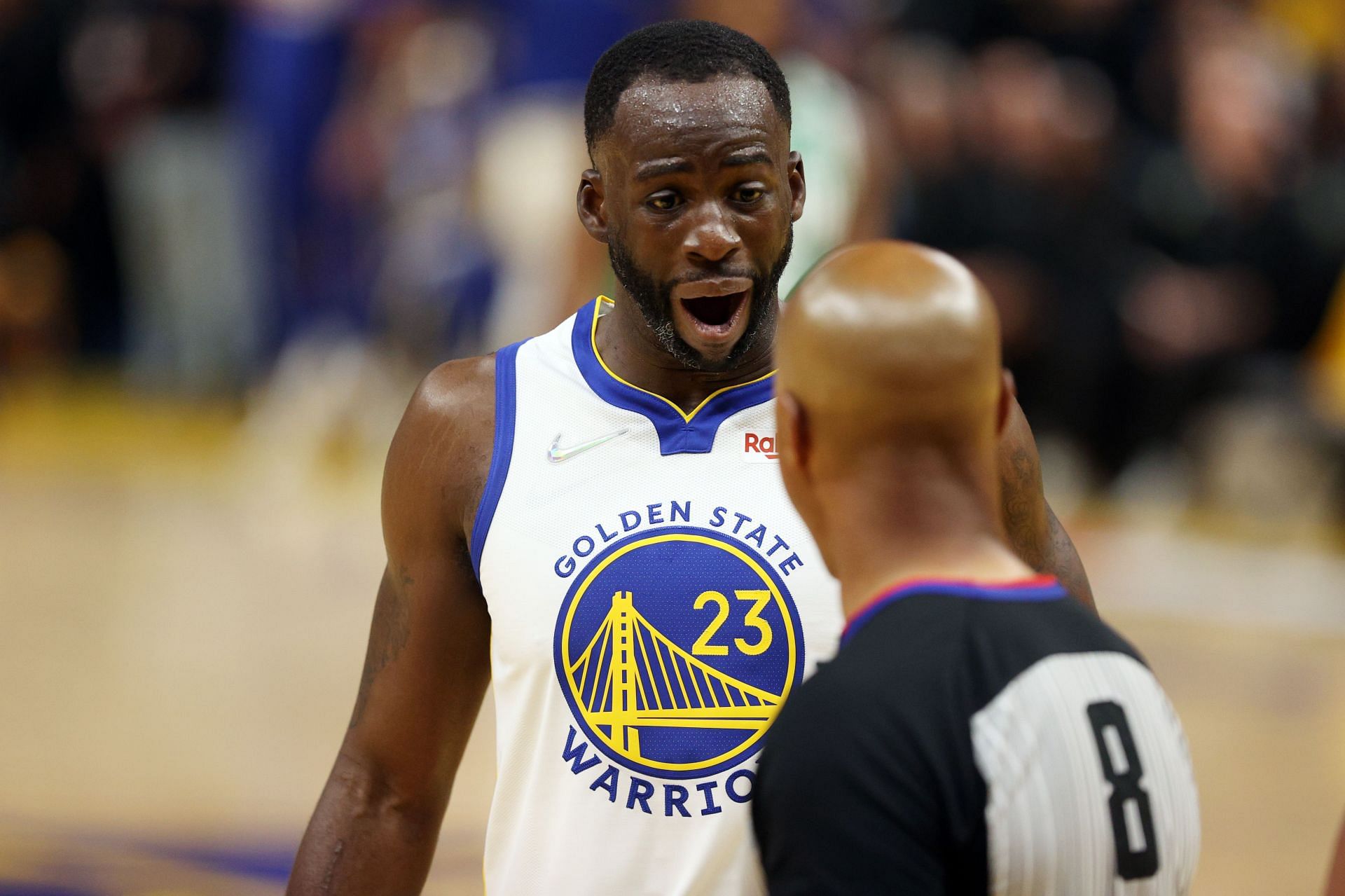 Draymond Green #23 of the Golden State Warriors speaks to referee Marc Davis #8 during the third quarter against the Boston Celtics in Game One of the 2022 NBA Finals at Chase Center on June 02, 2022 in San Francisco, California.